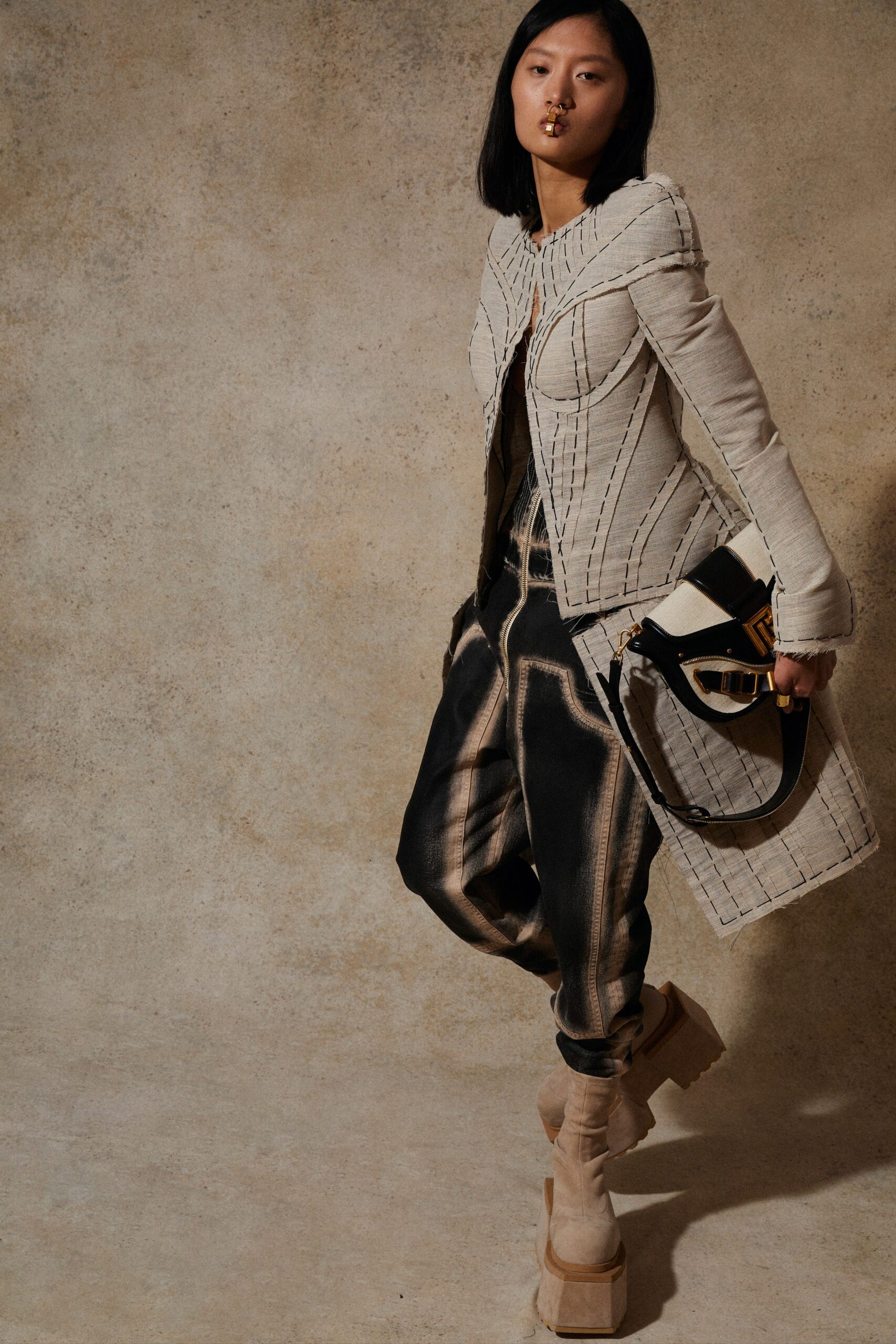 beige structured jacket with relaxed pants