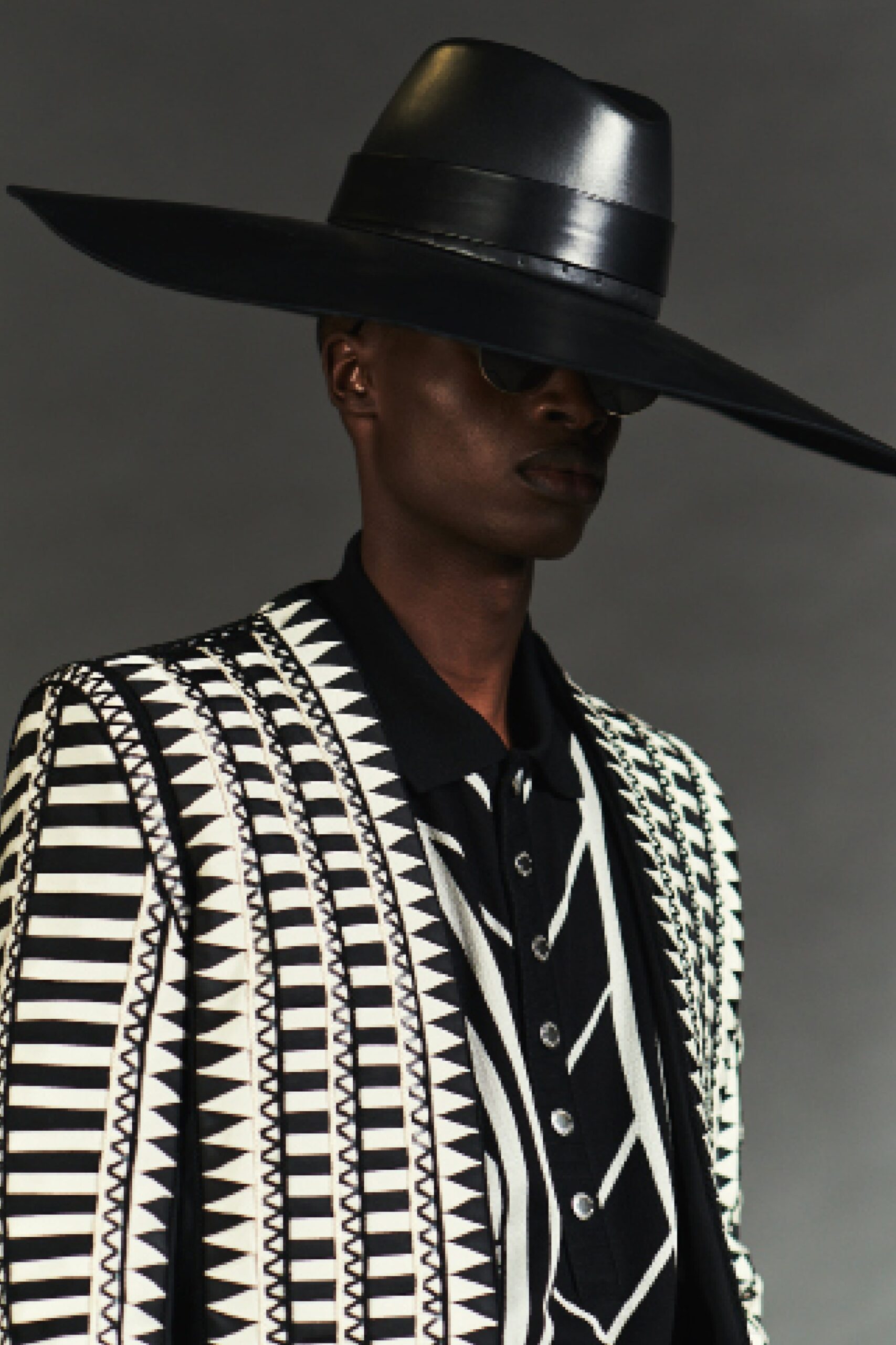 black cotton long-sleeve collared structured buttoned printed blazer