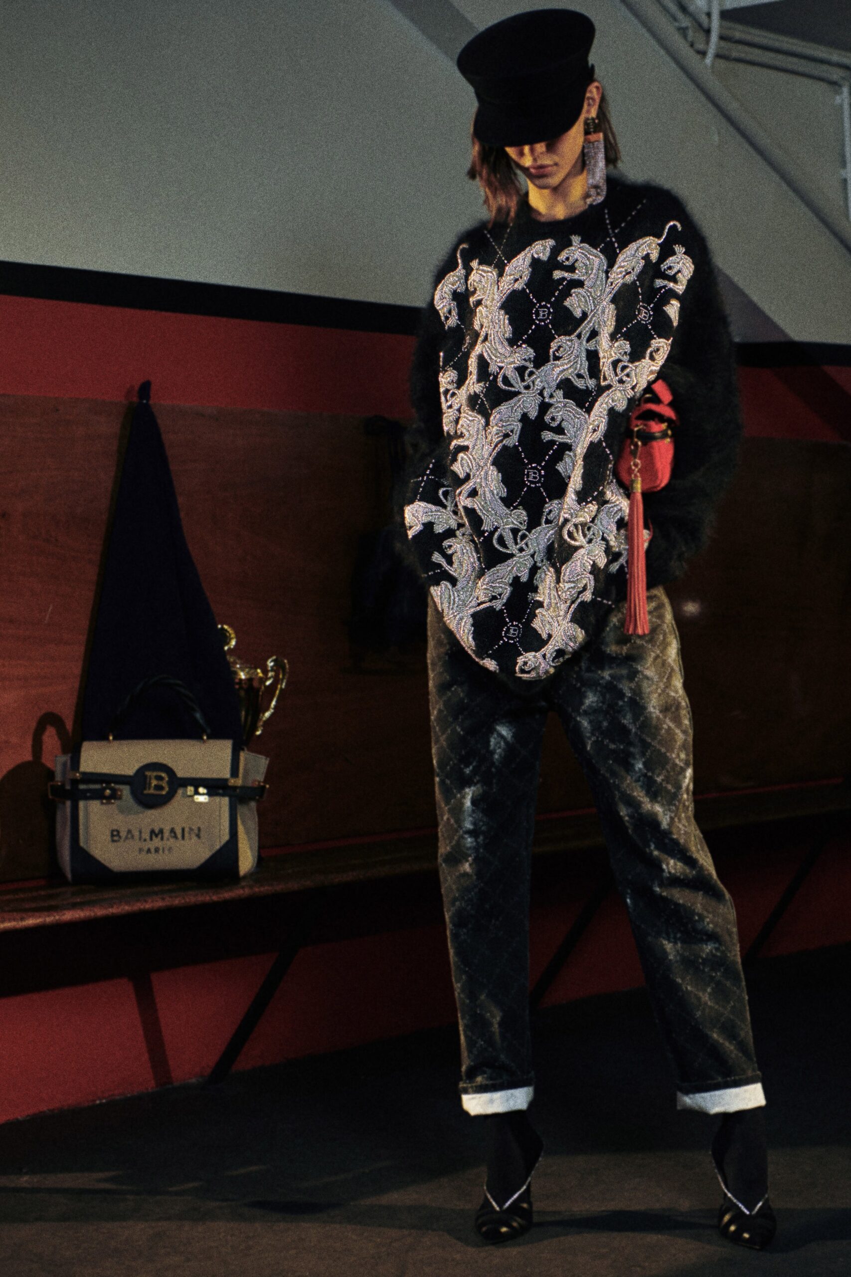 black embroidered top with tailored pants