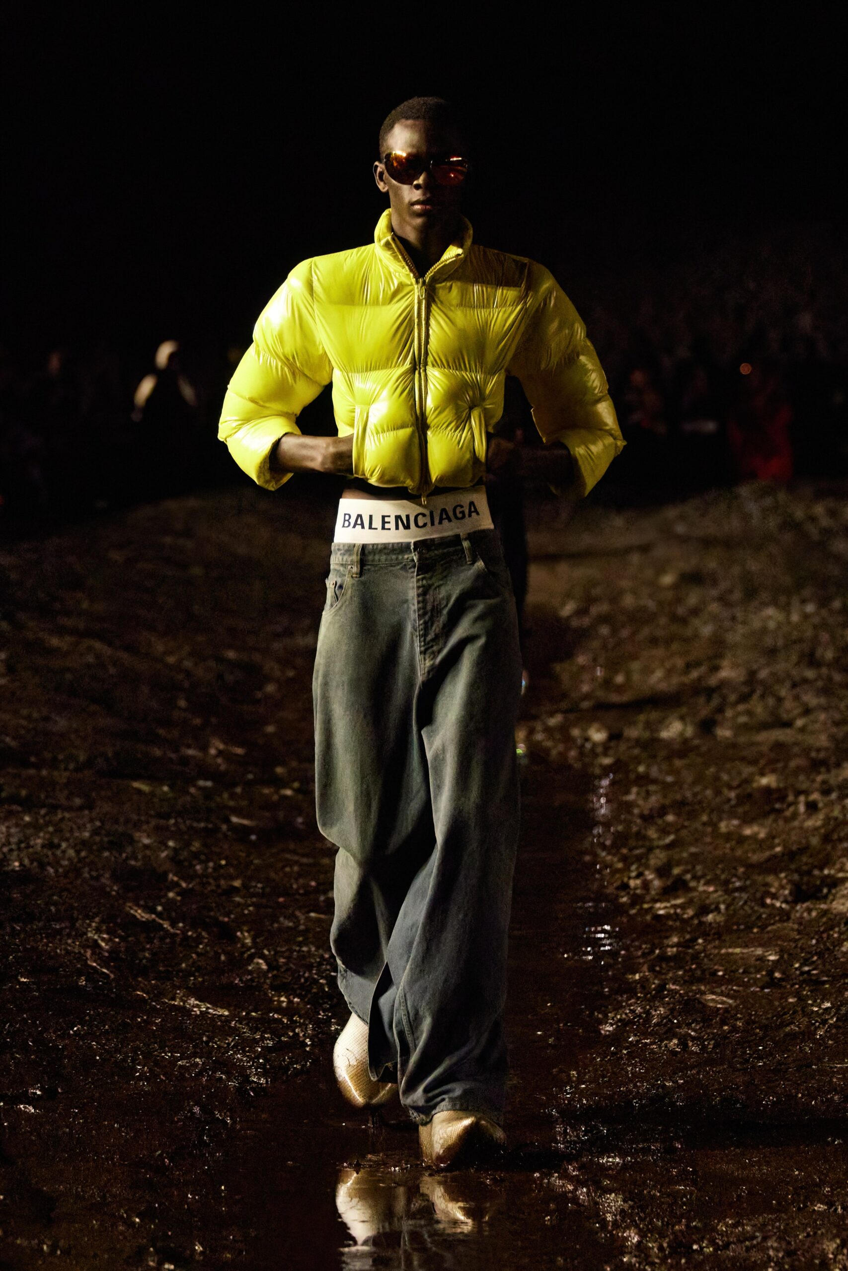 yellow fitted jacket and blue relaxed pants