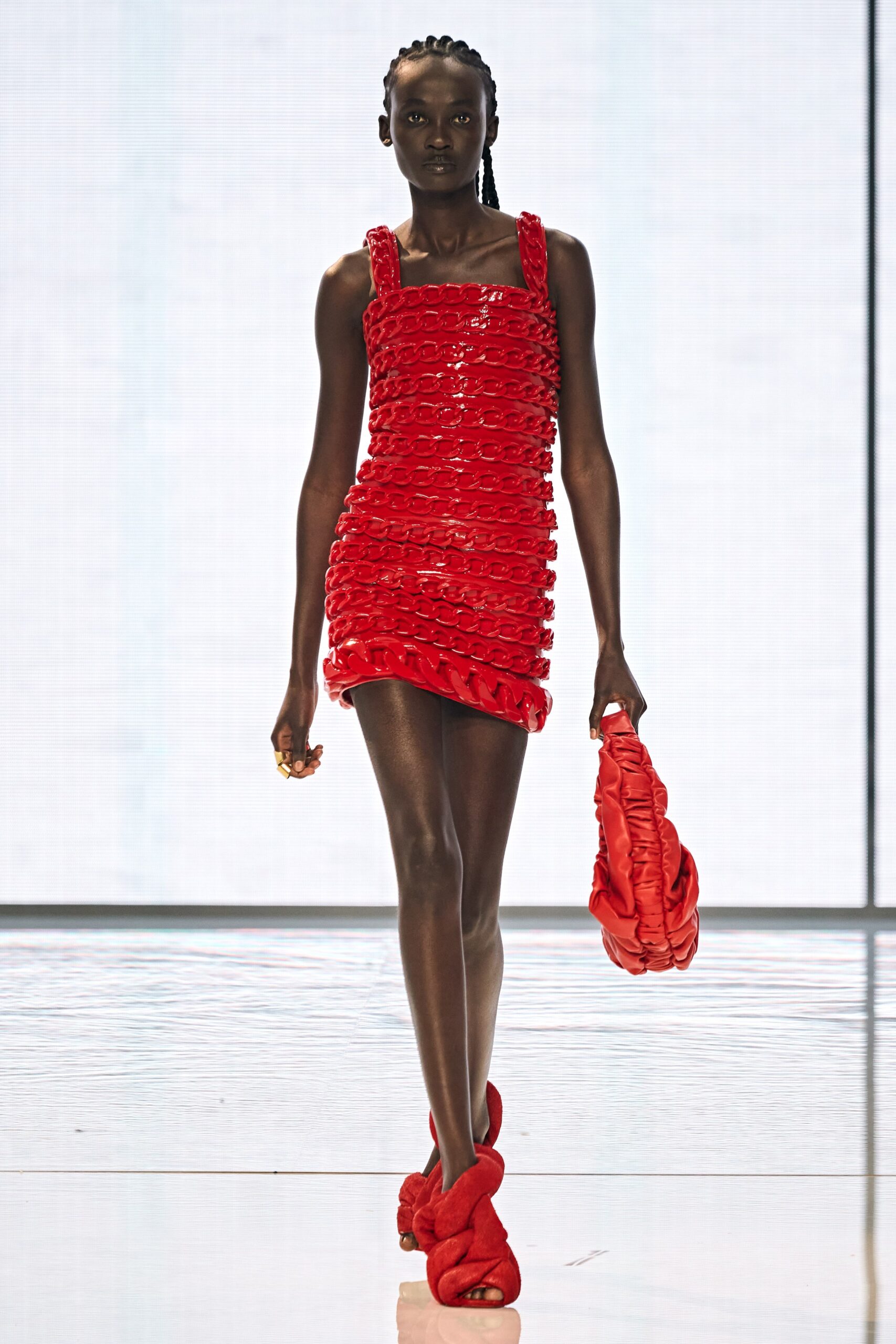 red ruched mini-dress with bag
