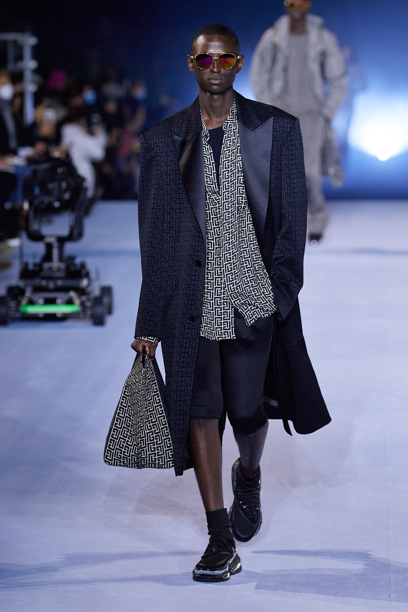 black wool coat with printed shirt