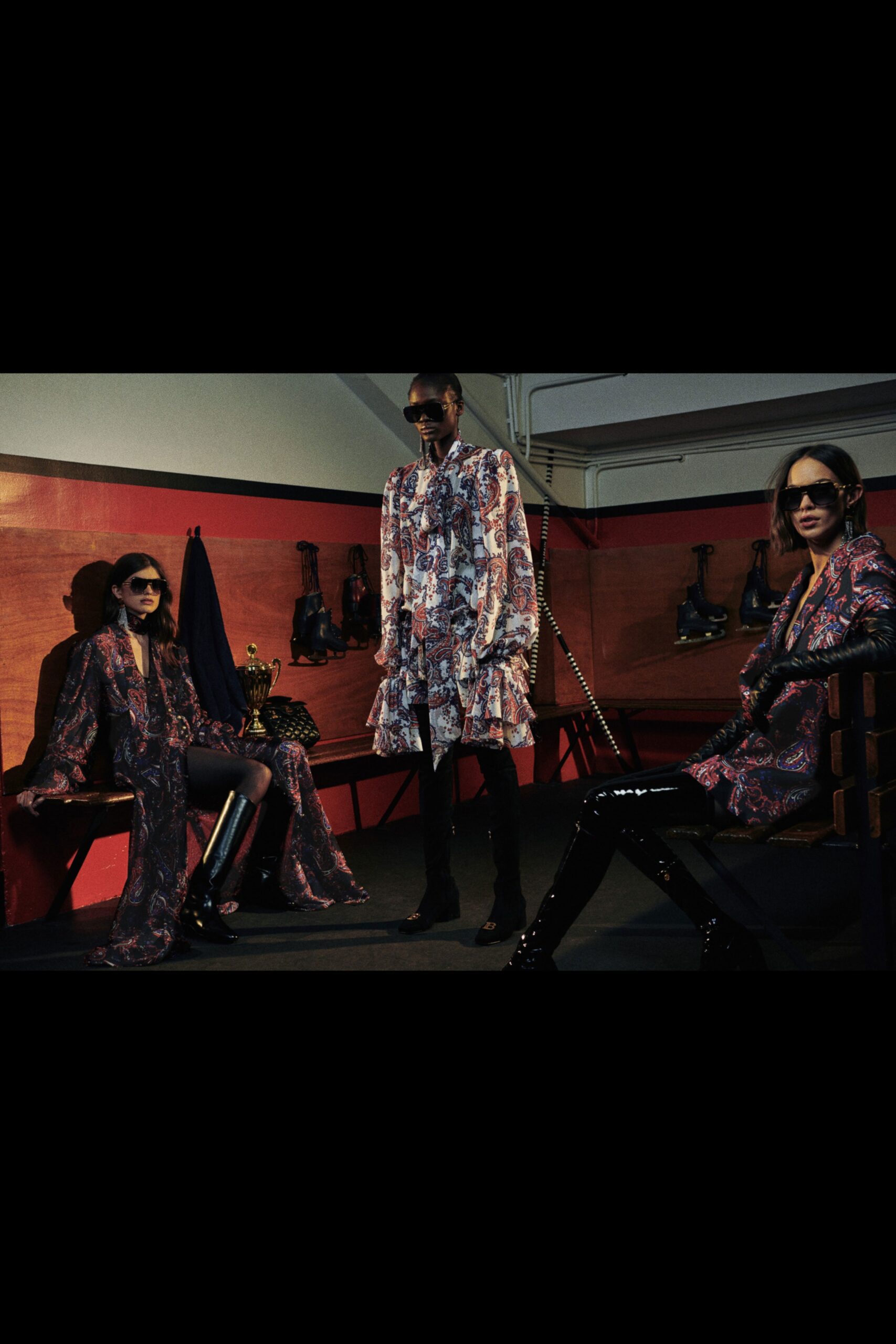 multi-patterned silk dresses and black vinyl pants