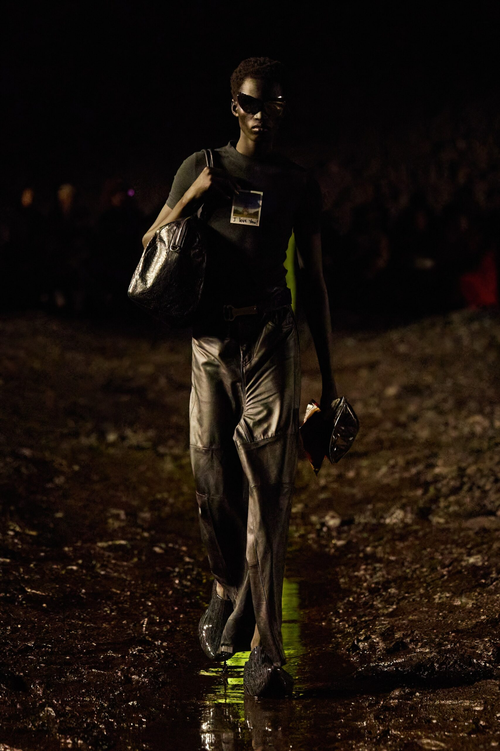 black fitted top and leather pants