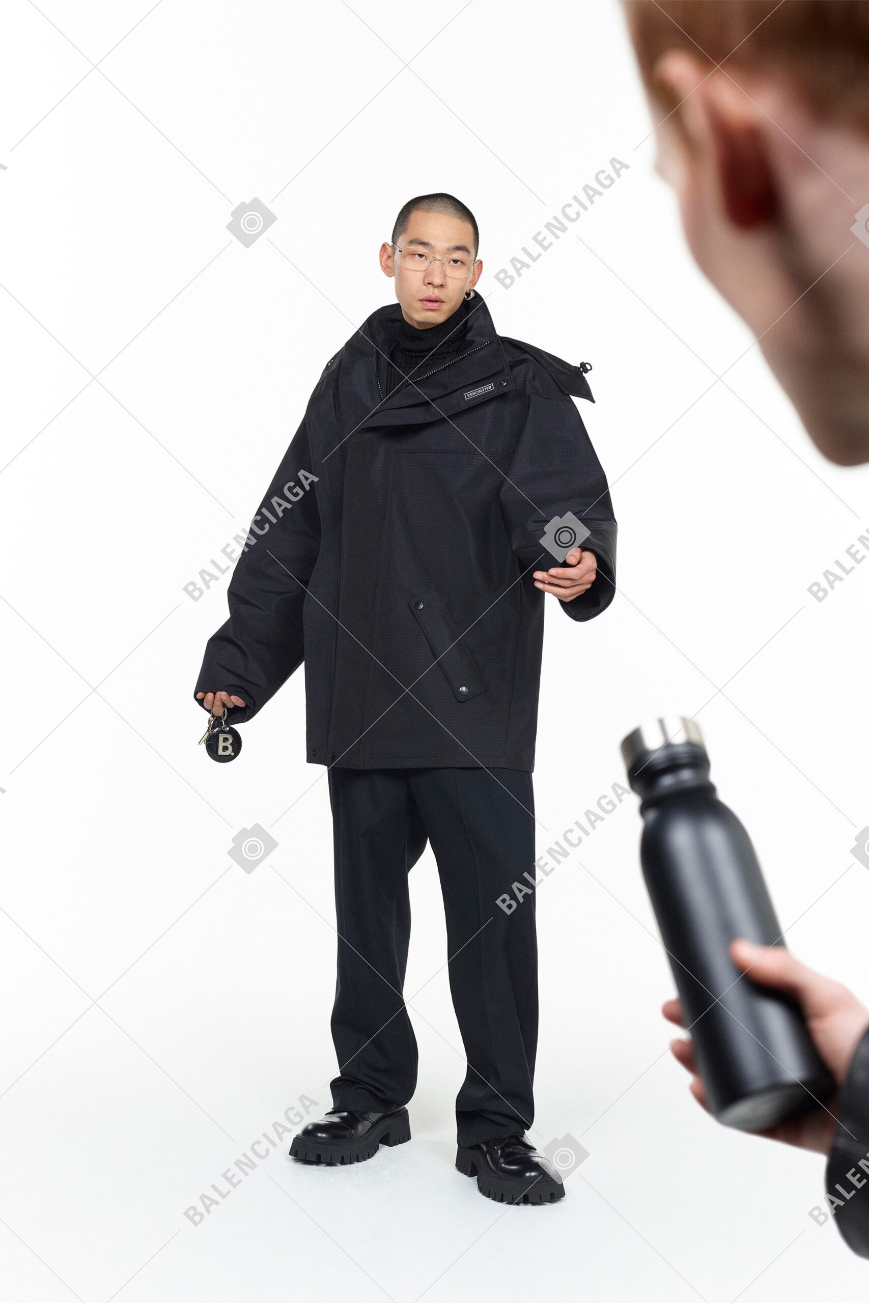 oversized black vinyl jacket