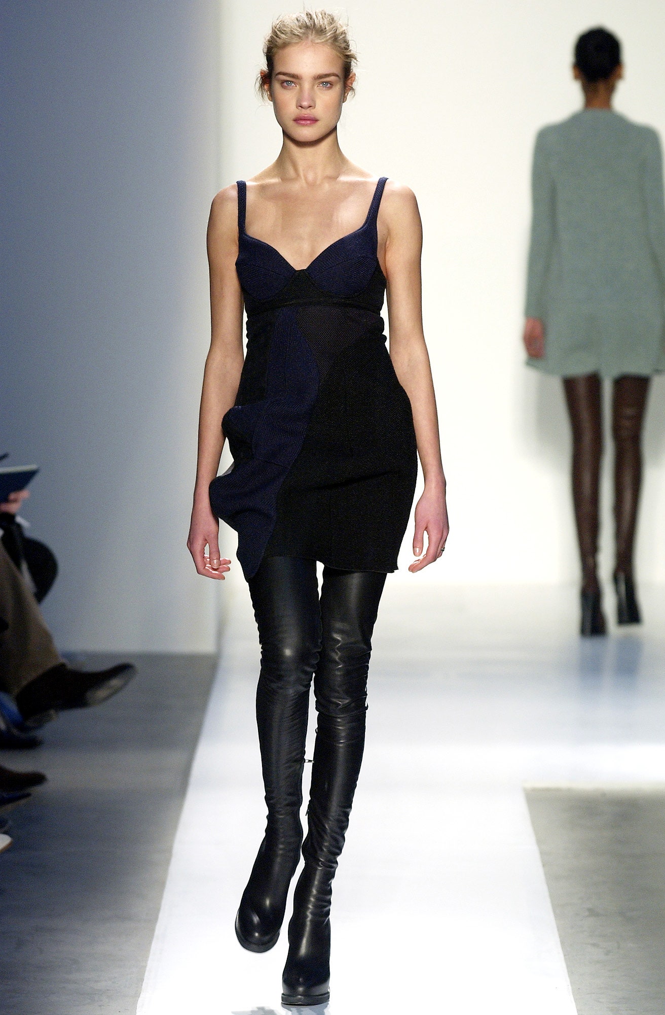 black and blue fitted dress with leather pants