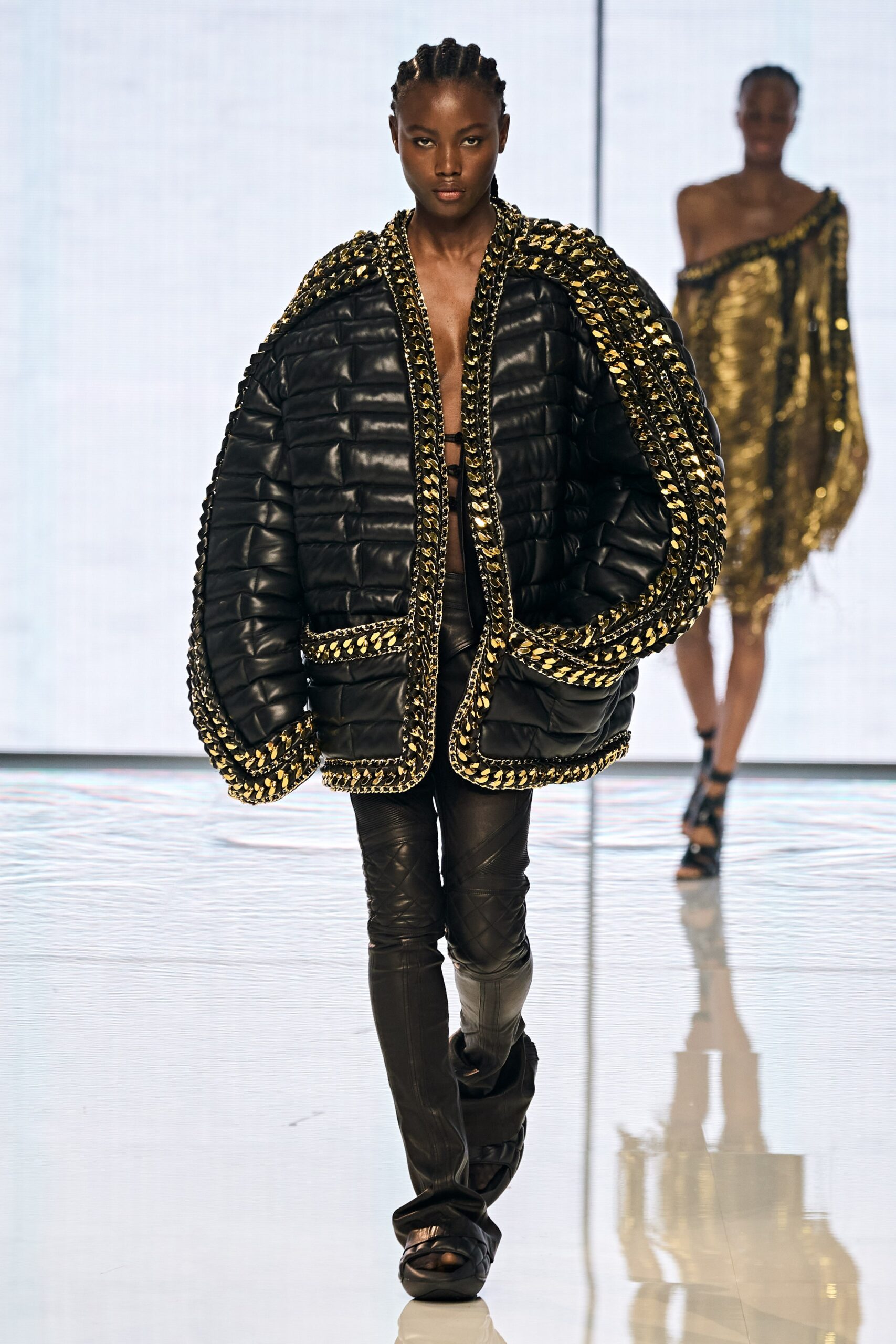 black leather long-sleeve collared oversized padded zippered jacket