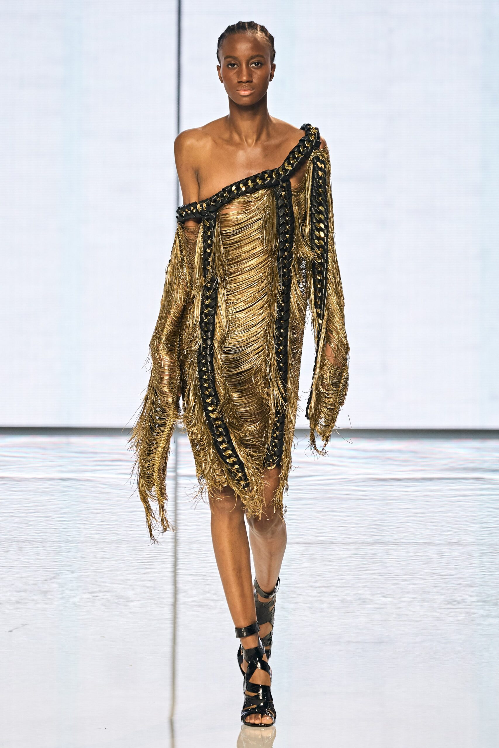 gold fringed off-shoulder dress