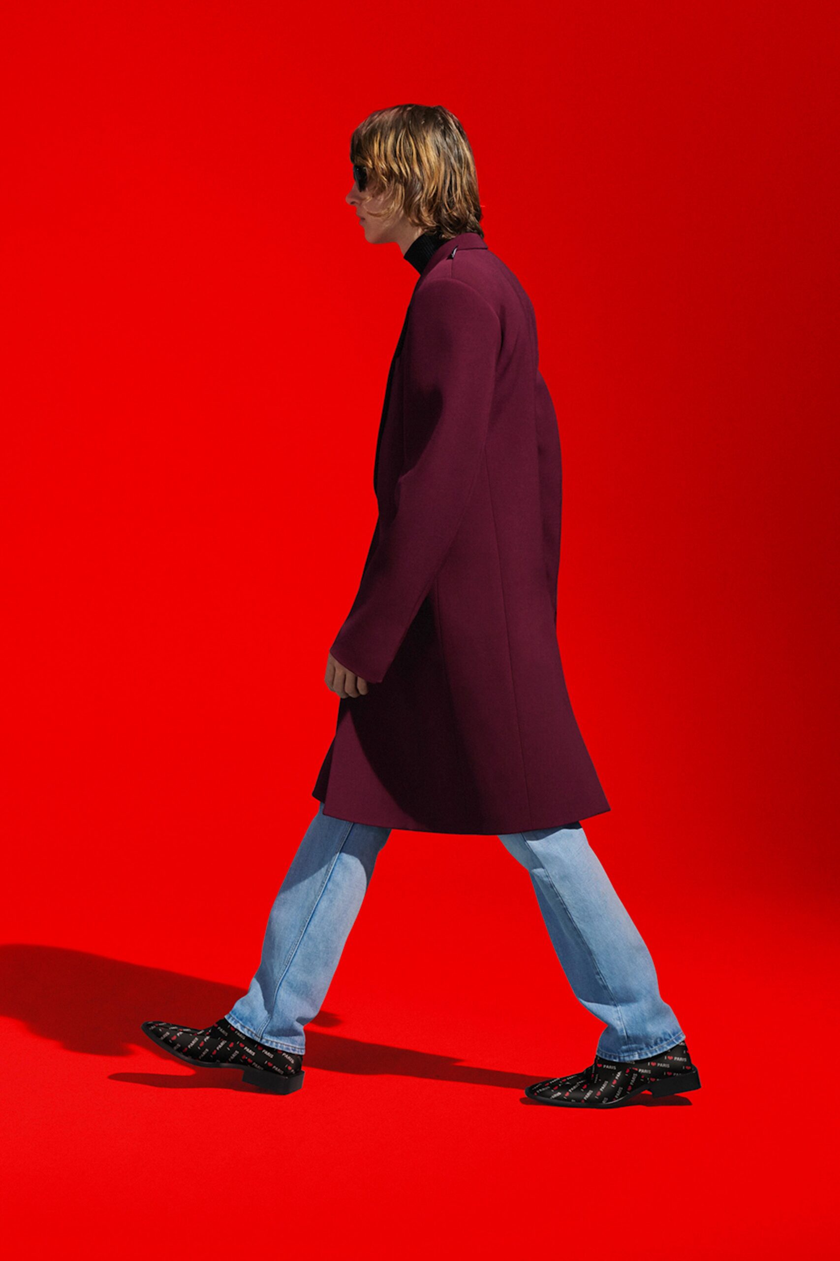 purple tailored coat with jeans