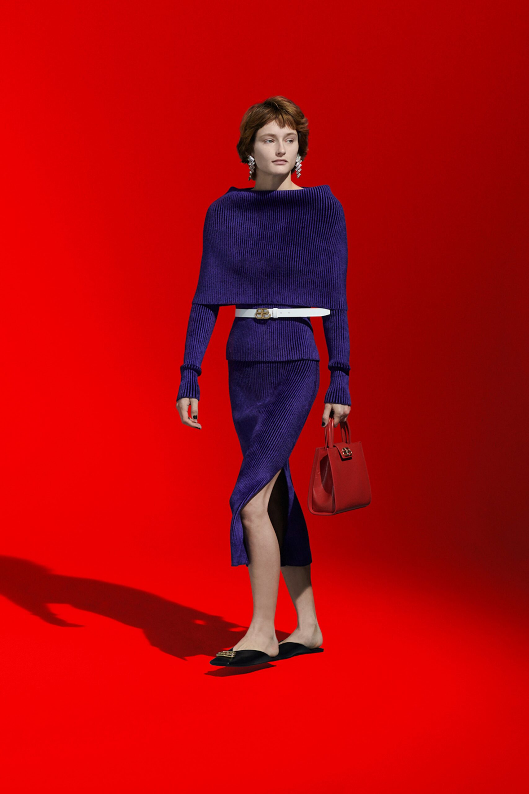 fitted purple knit top and skirt