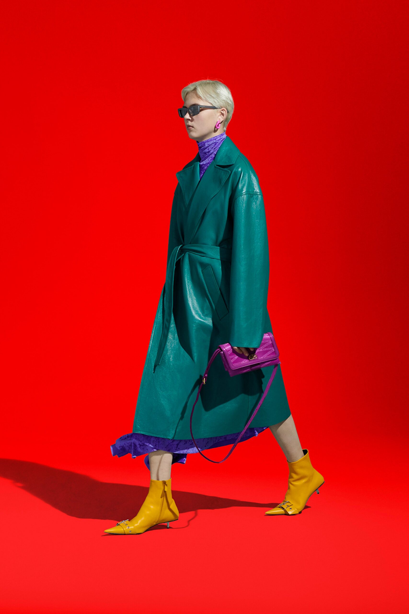 teal leather coat with purple dress