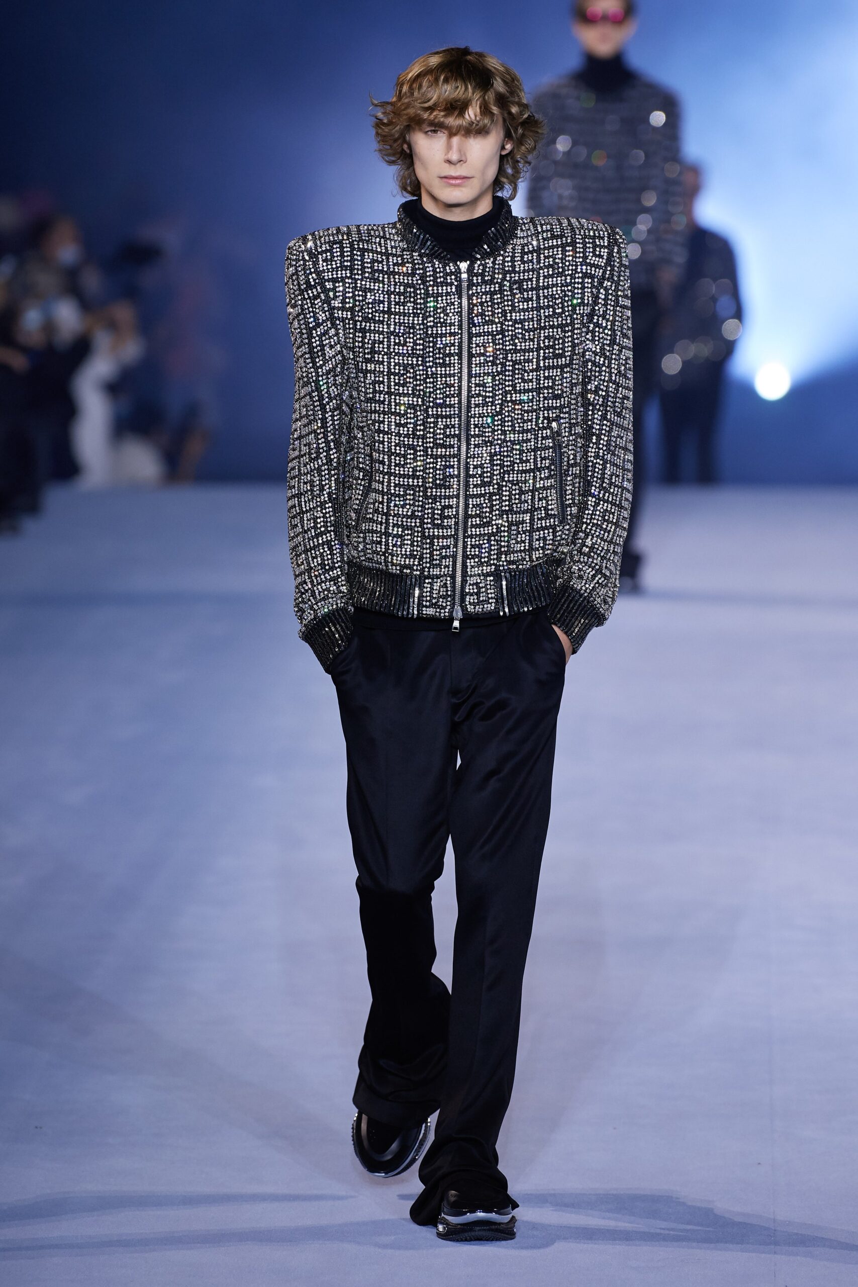 structured black and white jacket with relaxed pants