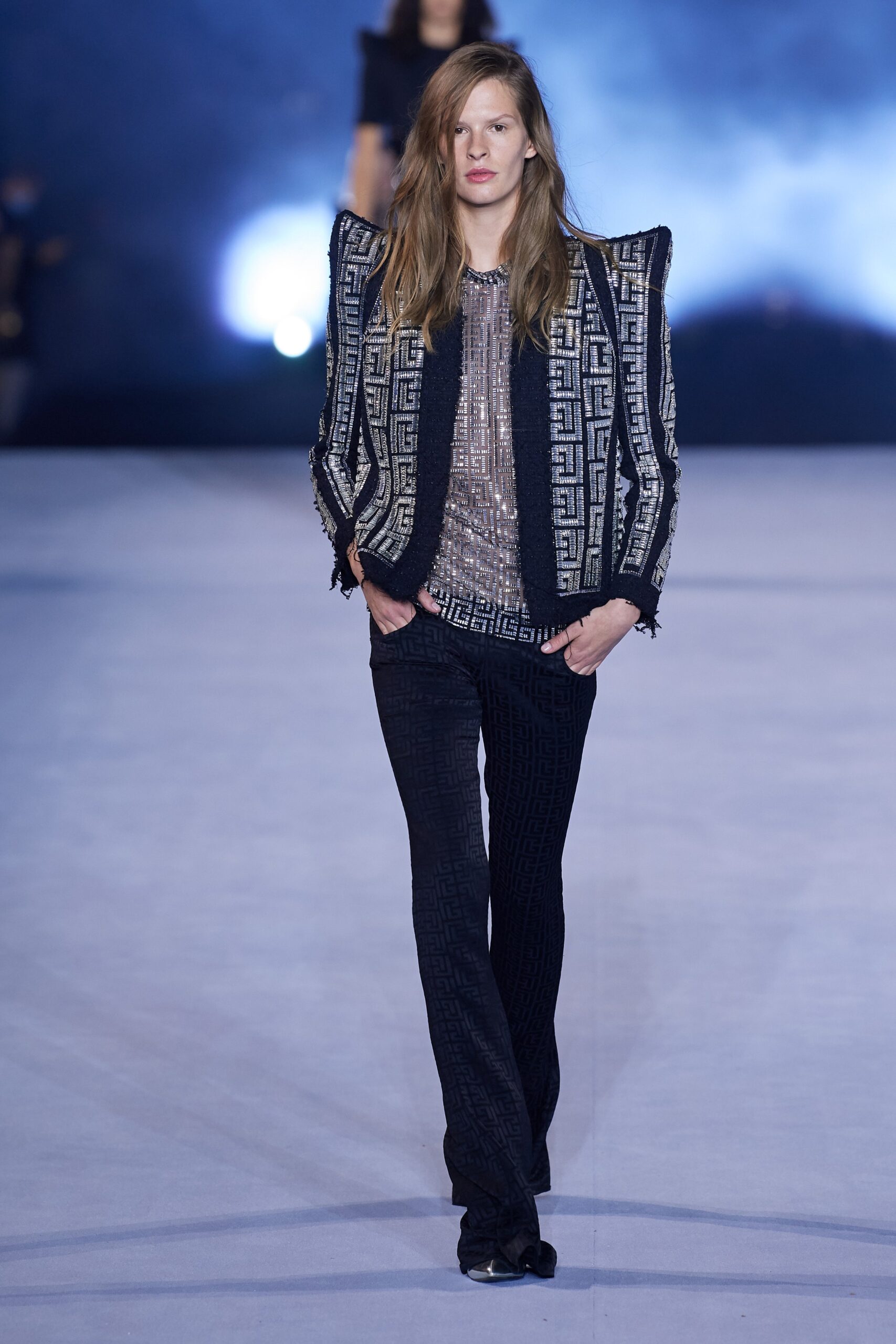 black and white tailored blazer with slim pants