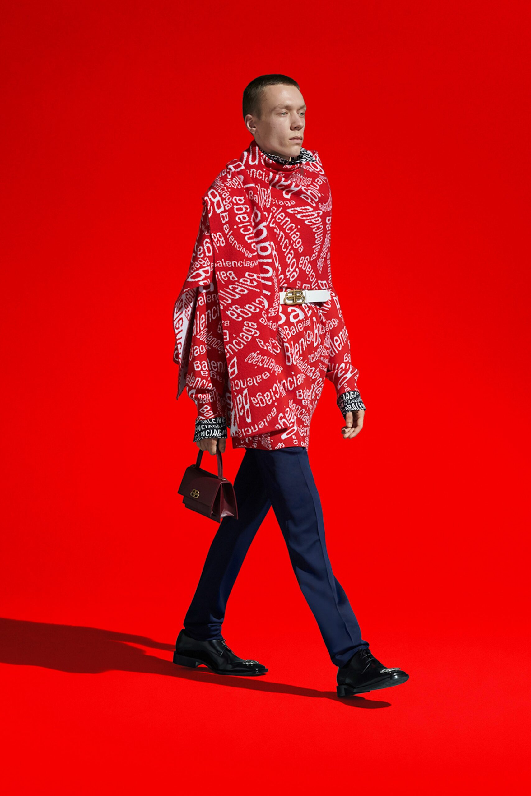 red printed top with blue pants