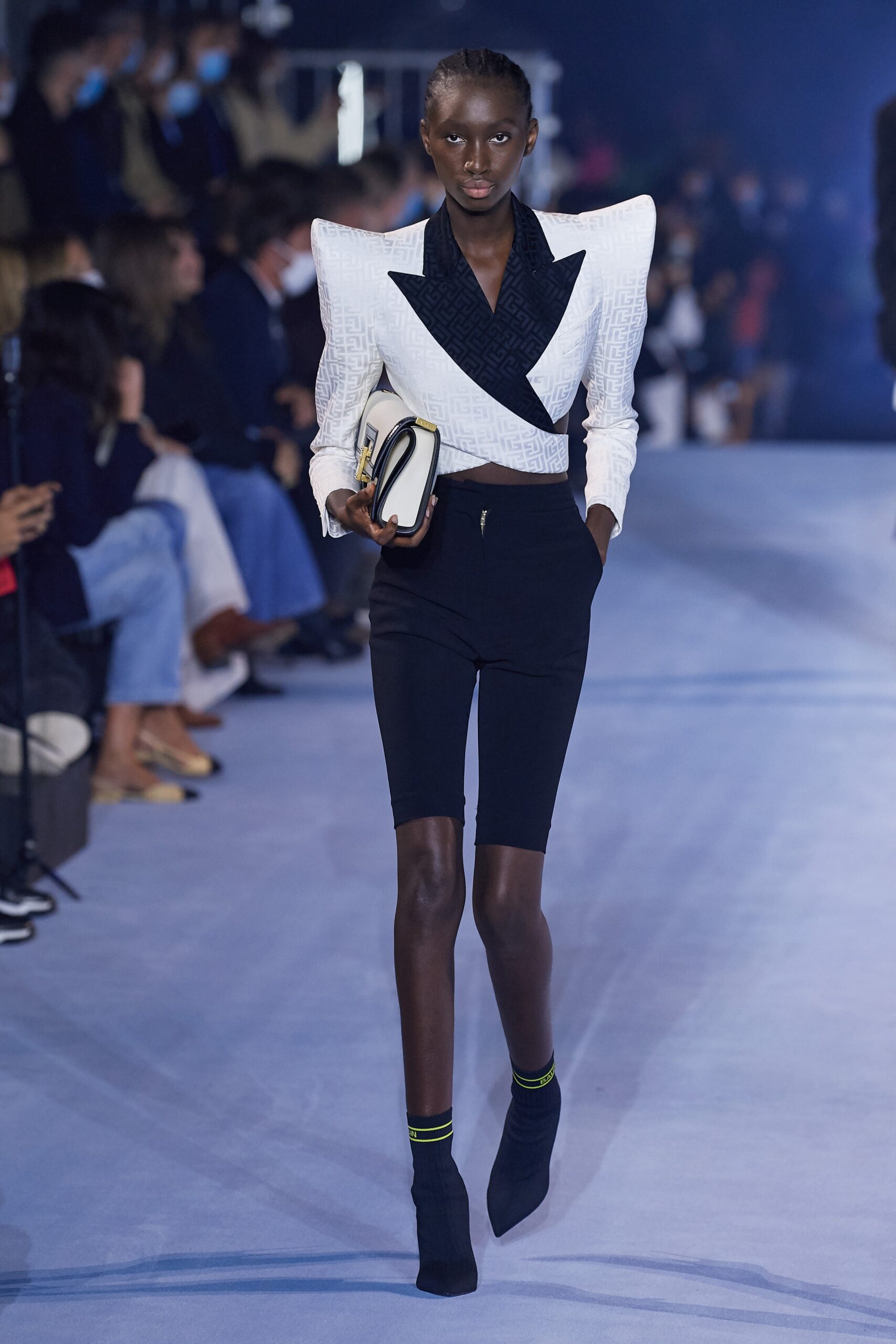 fitted black shorts and structured blazer