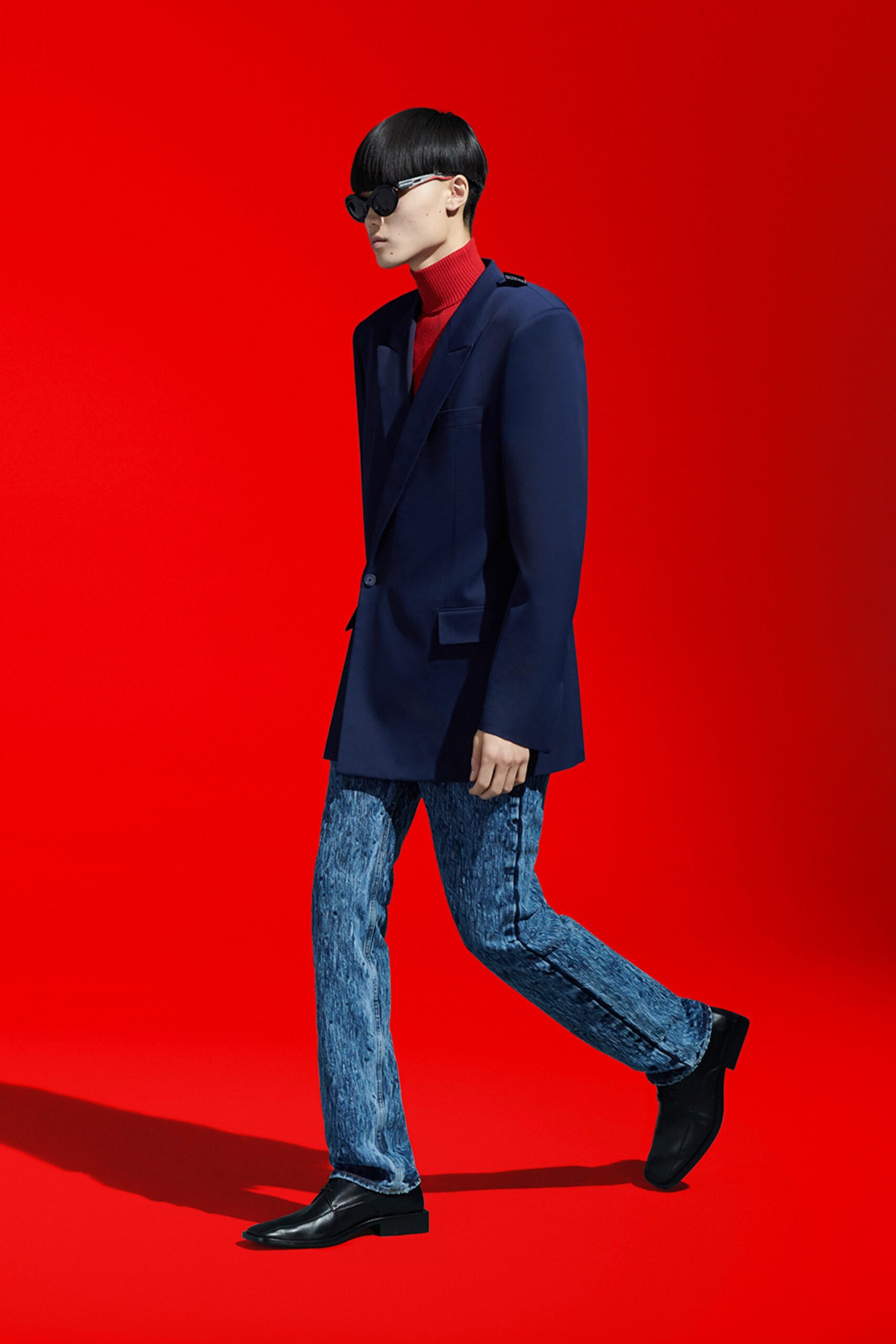 blue blazer with red turtleneck