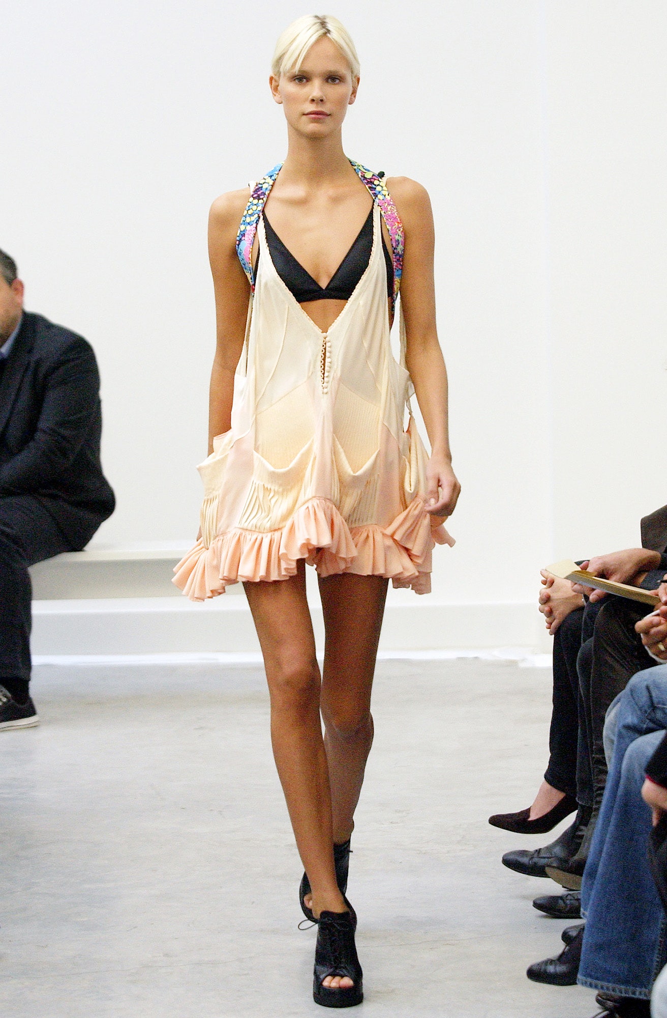 peach ruffled mini dress with black top