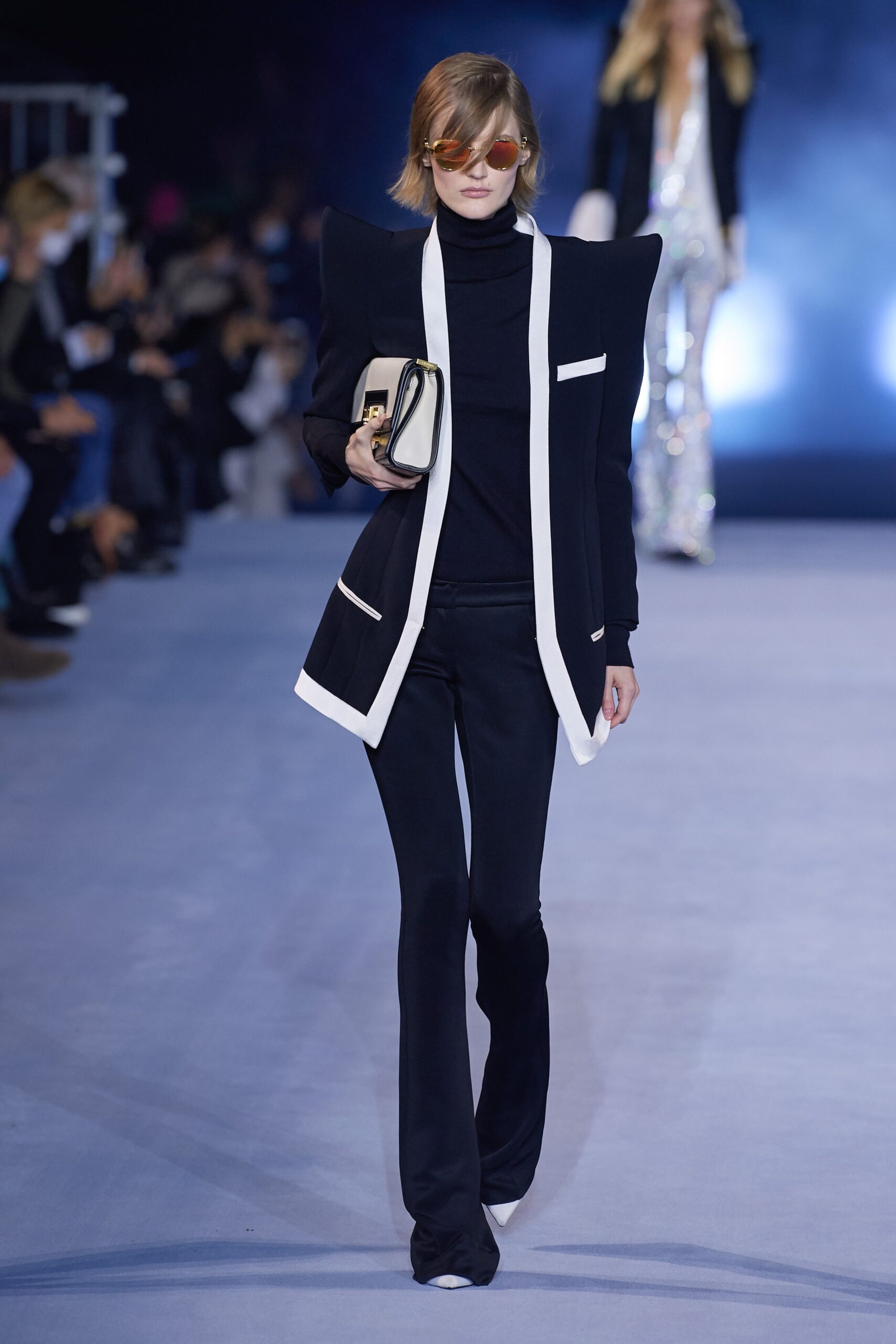 black and white structured blazer with flared pants