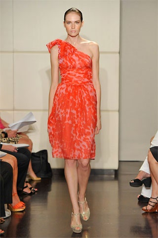 fitted orange silk one-shoulder dress