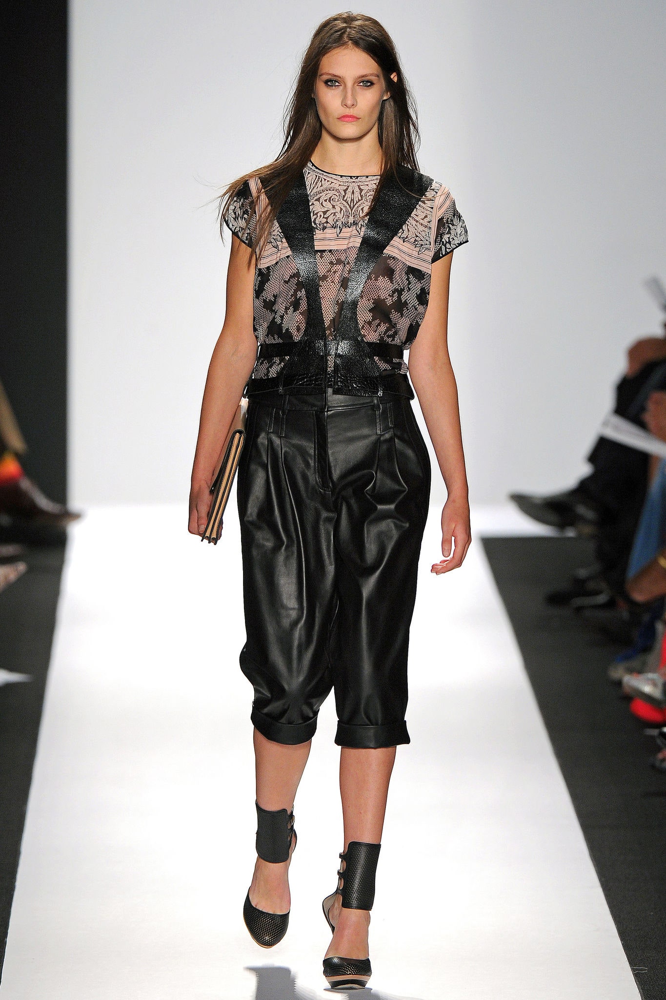 black leather relaxed pants and embroidered top