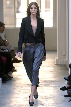 black tailored blazer with gray pants