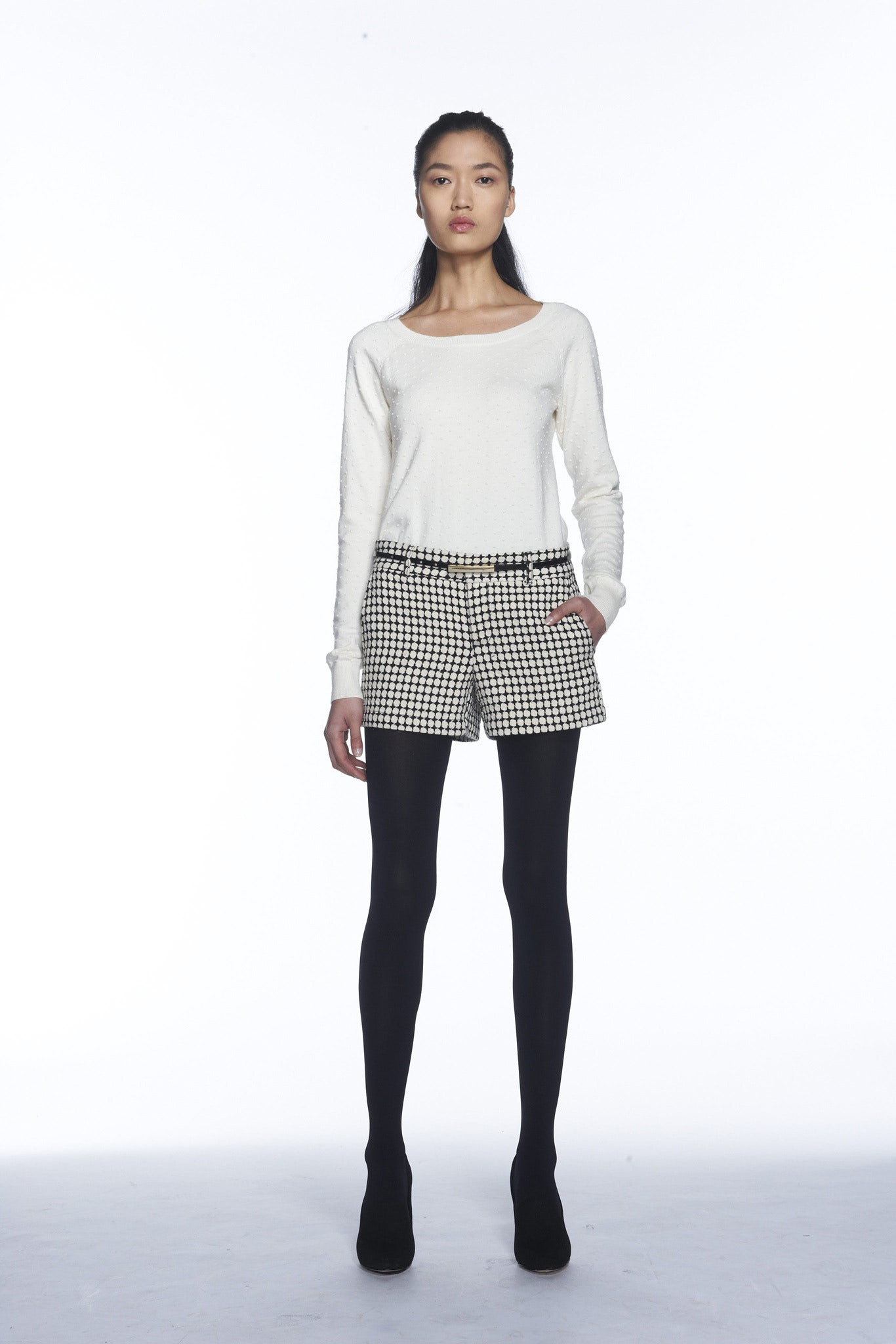 white fitted top with checked shorts