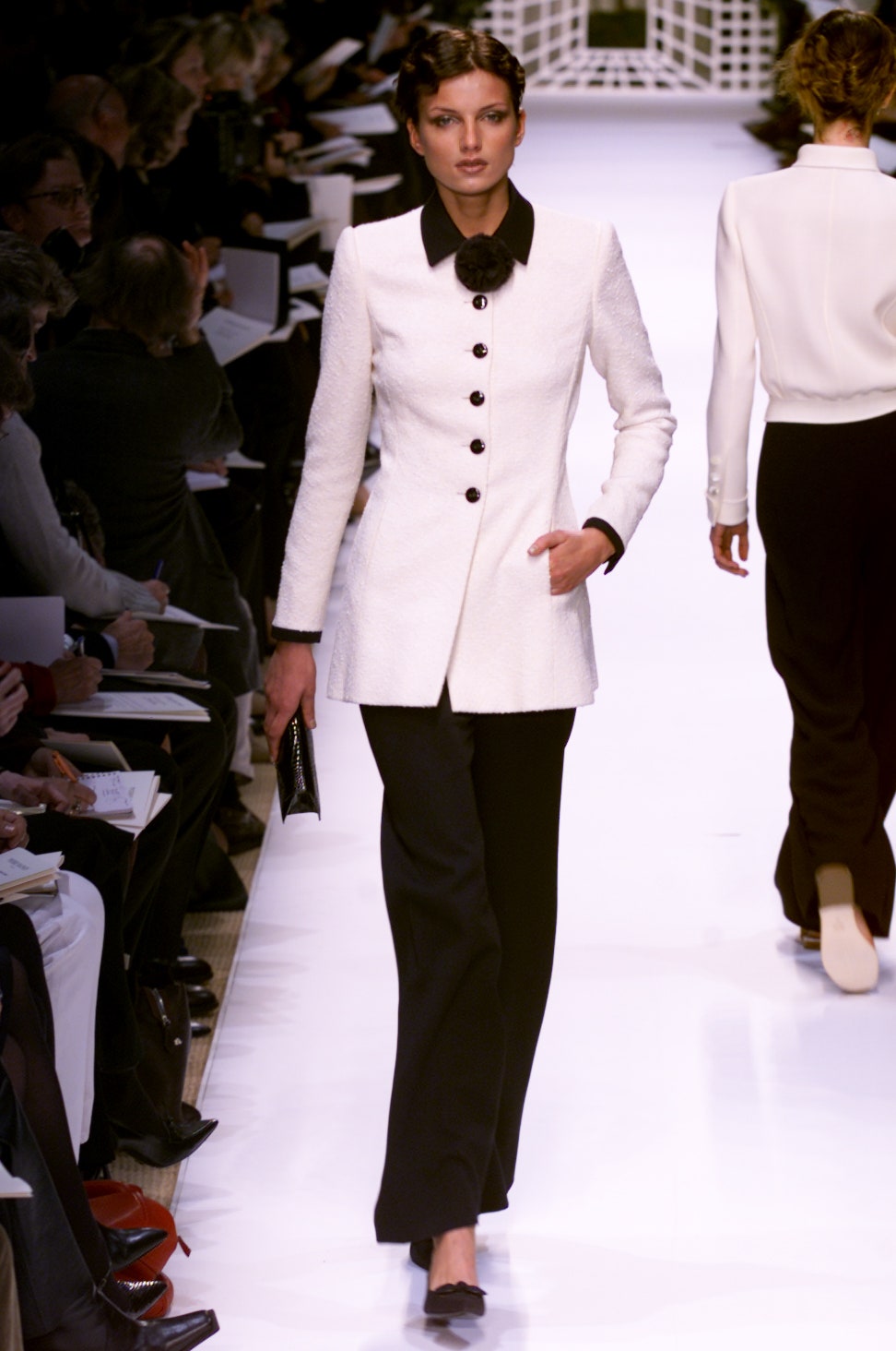 white tailored blazer with black pants