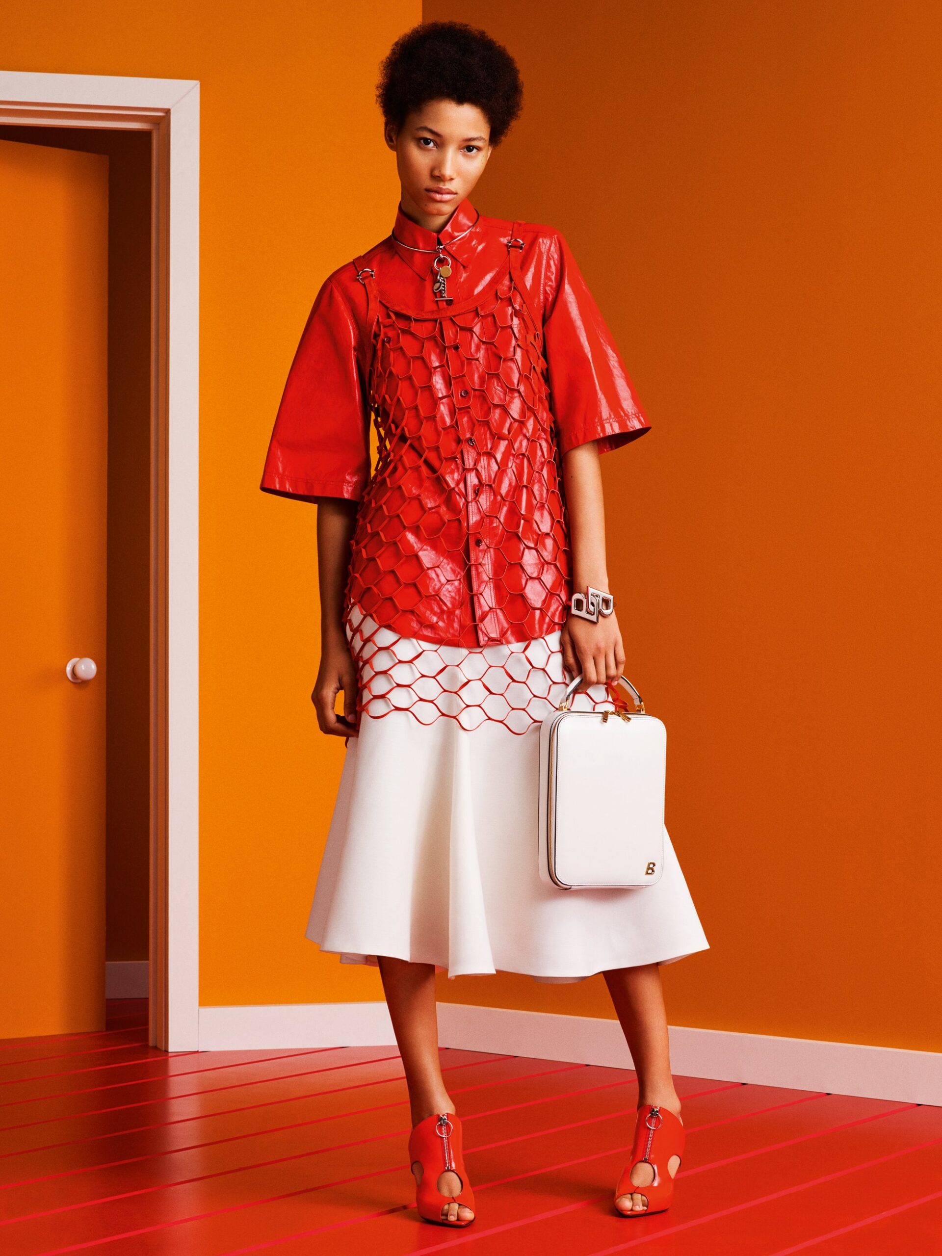 red leather short-sleeve collared fitted layered top