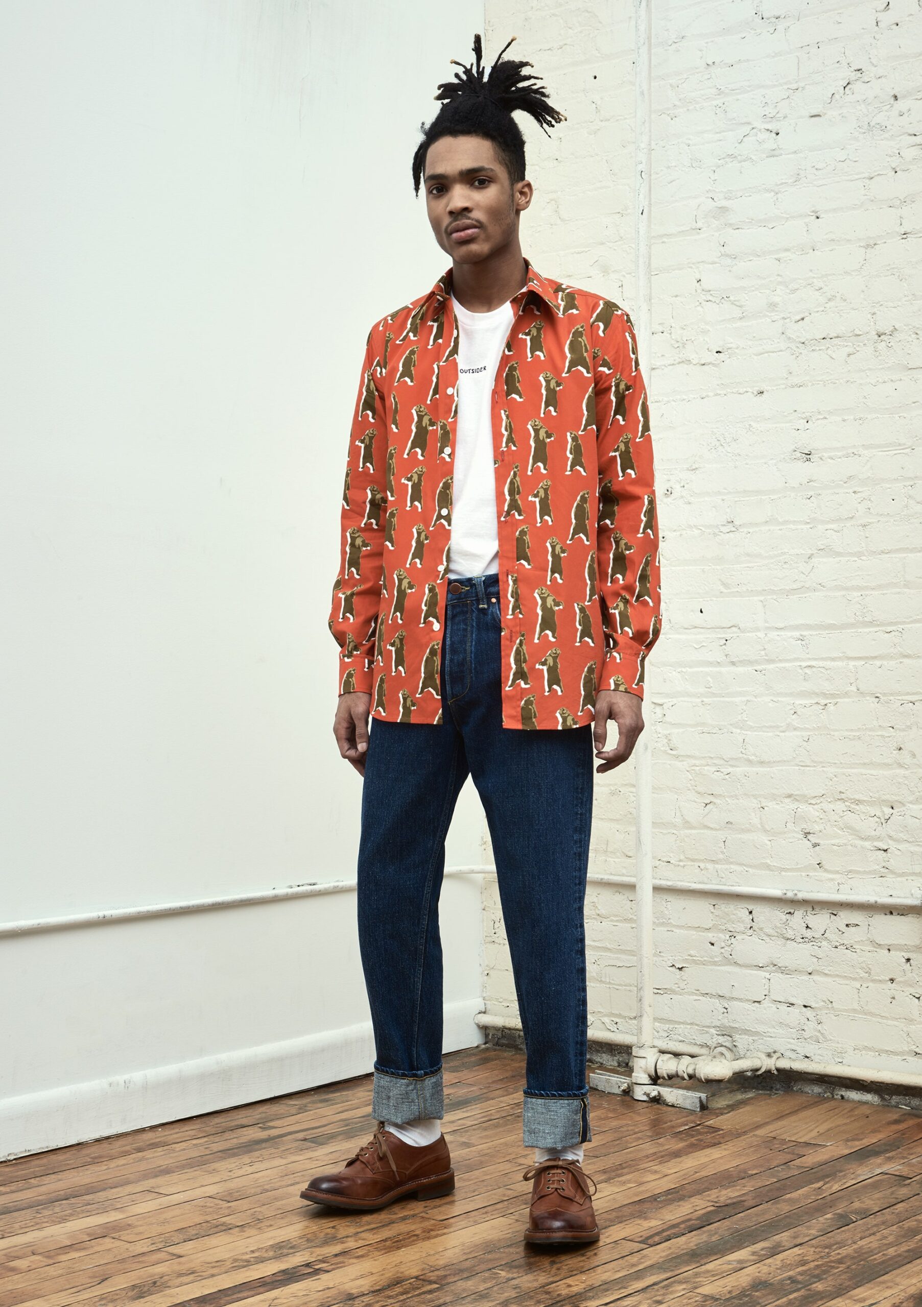 orange printed shirt with jeans