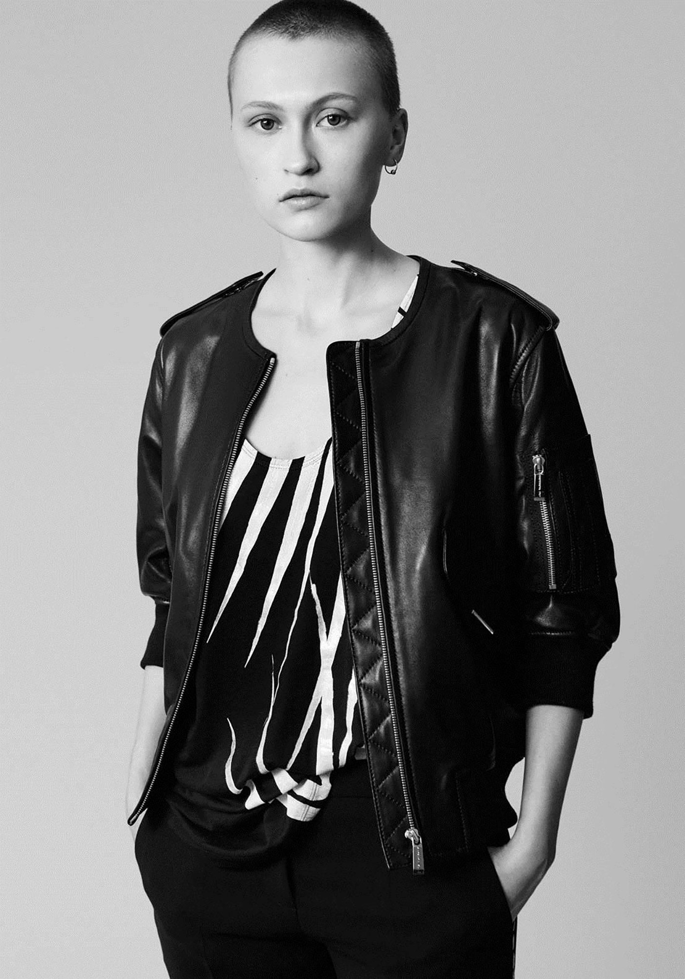 black leather jacket with printed top