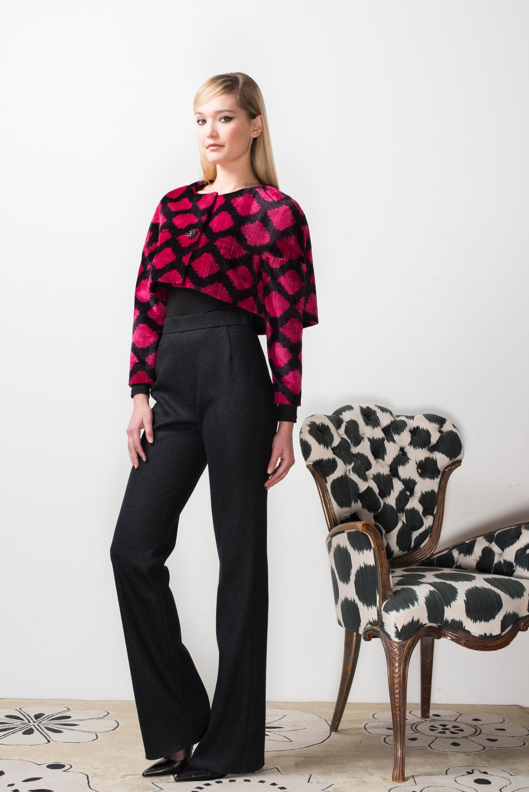 pink and black fitted top with tailored pants