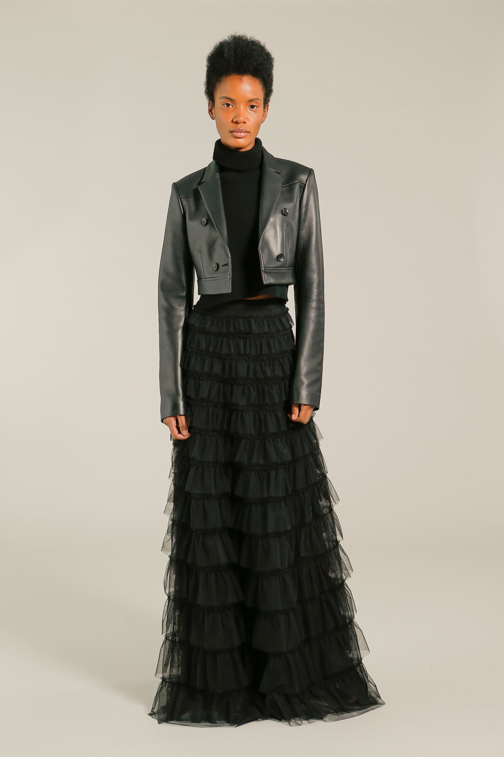 black leather jacket and tiered skirt