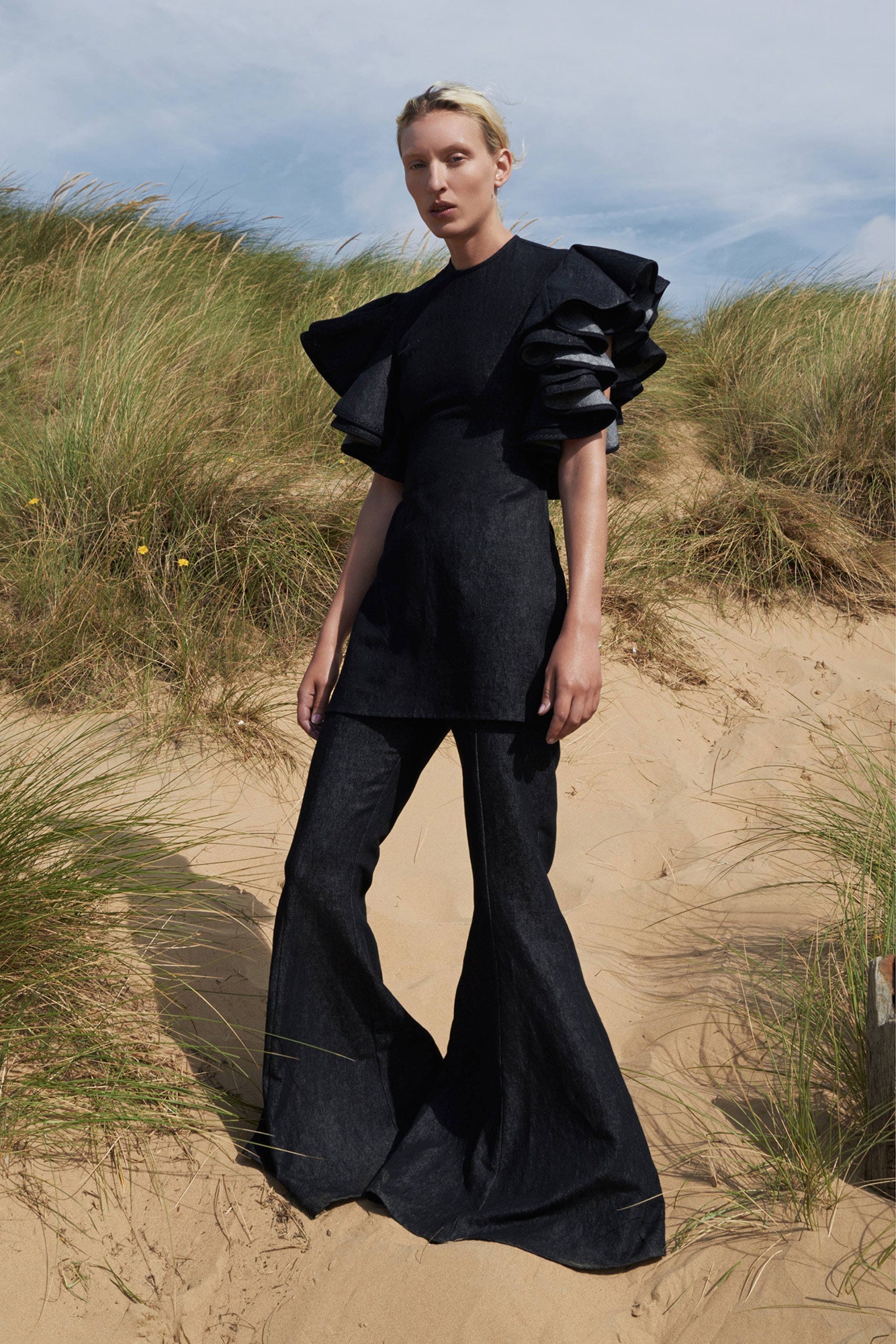 black ruffled structured top