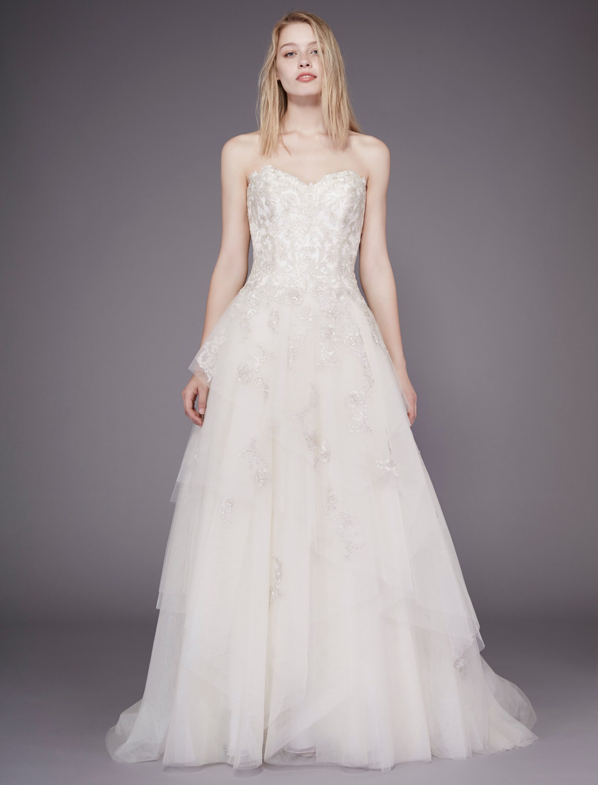 white strapless layered gown
