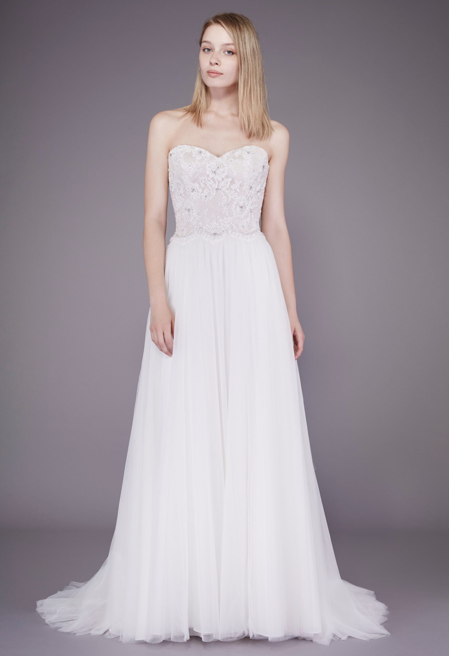 white strapless embroidered gown