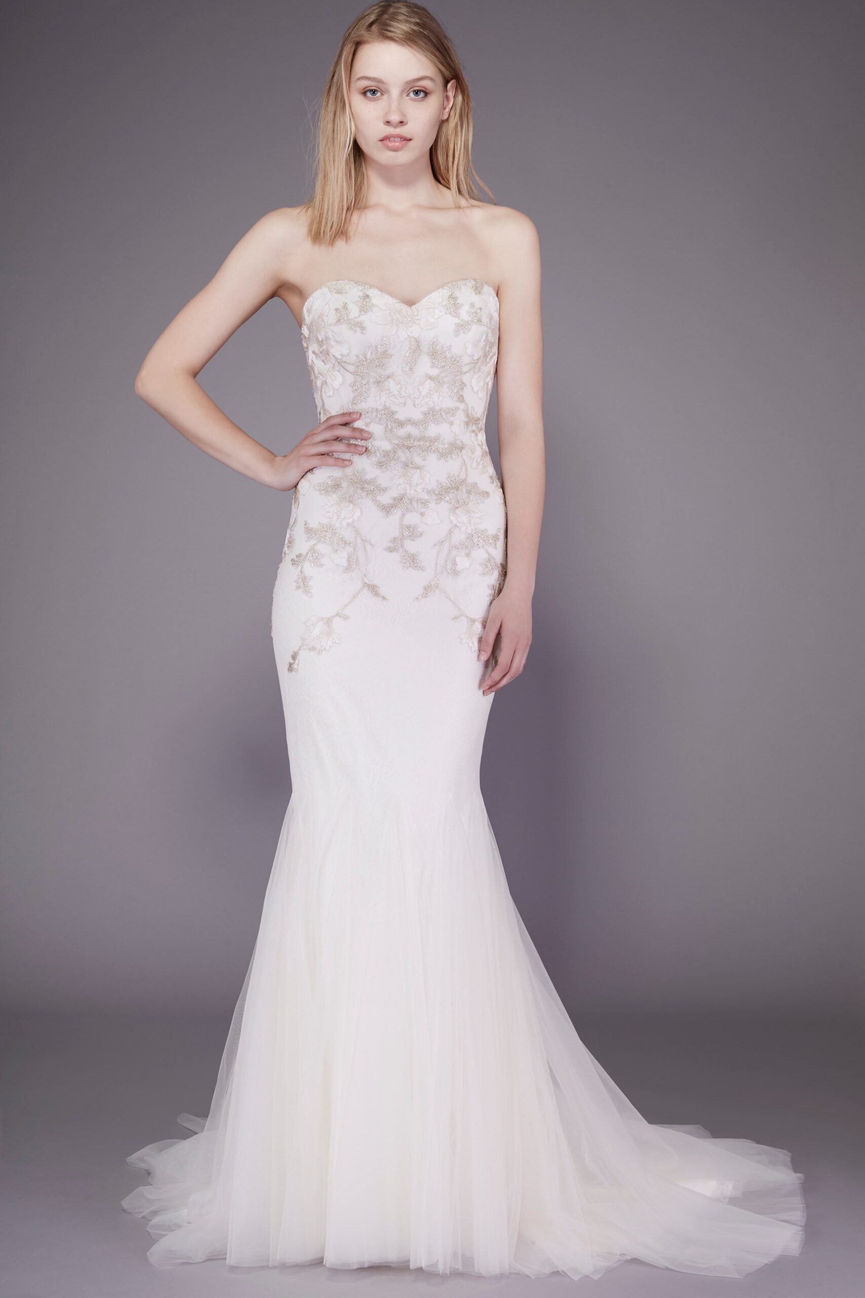 white strapless embroidered gown