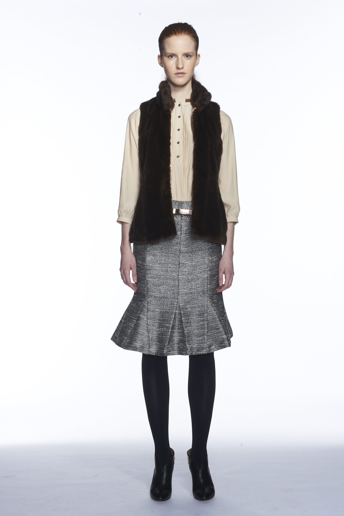 beige silk blouse with brown fur vest