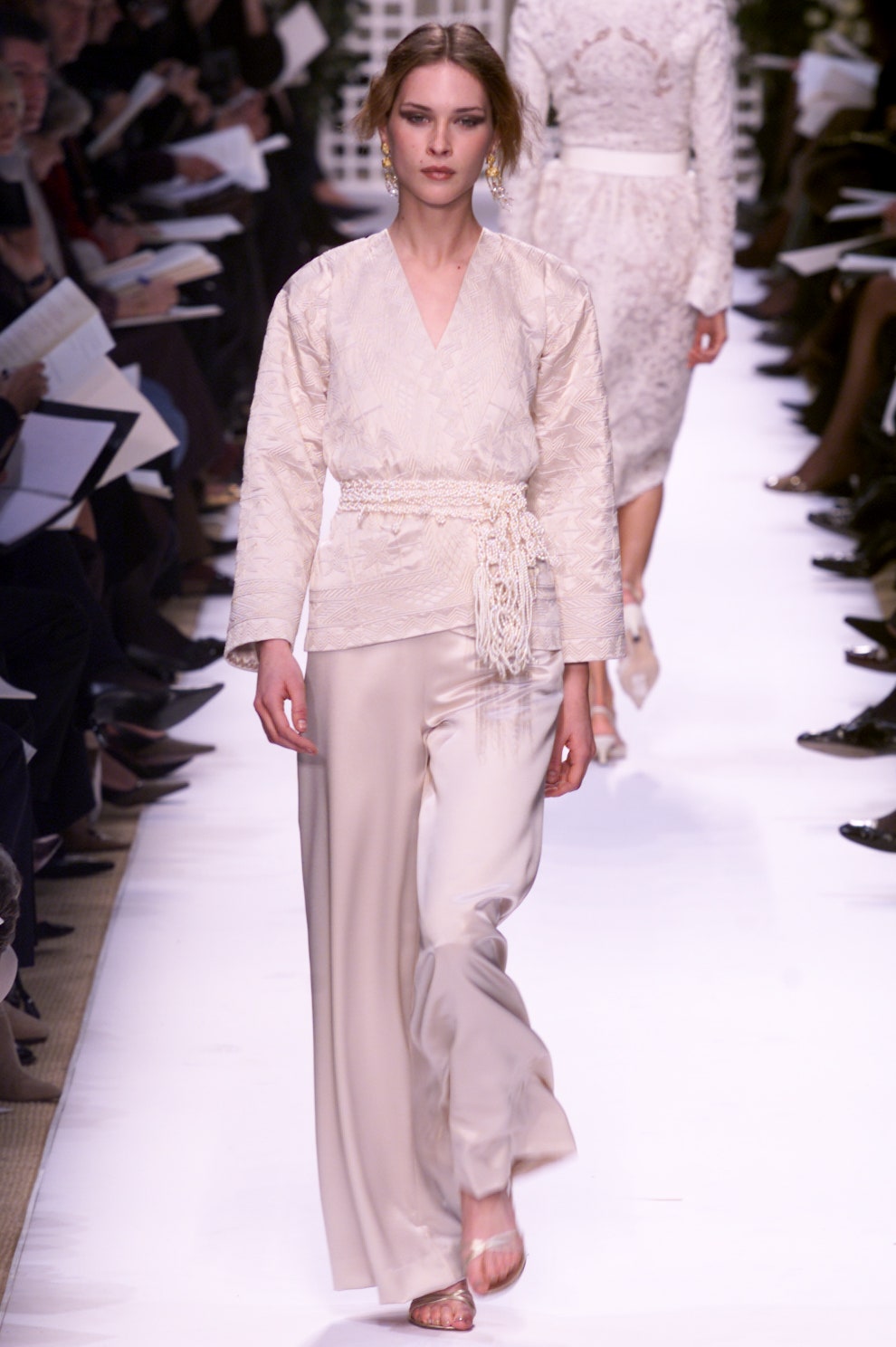 beige silk fitted top and relaxed pants