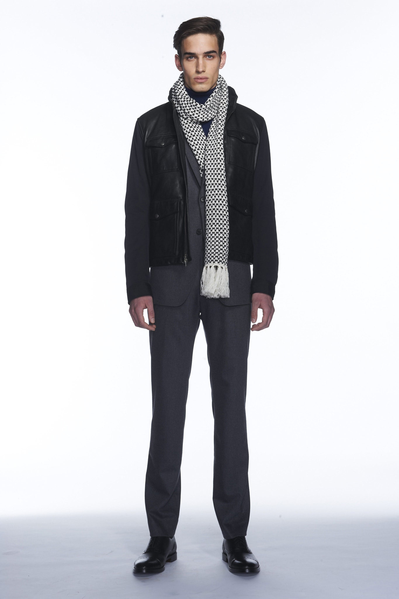 black leather jacket gray suit