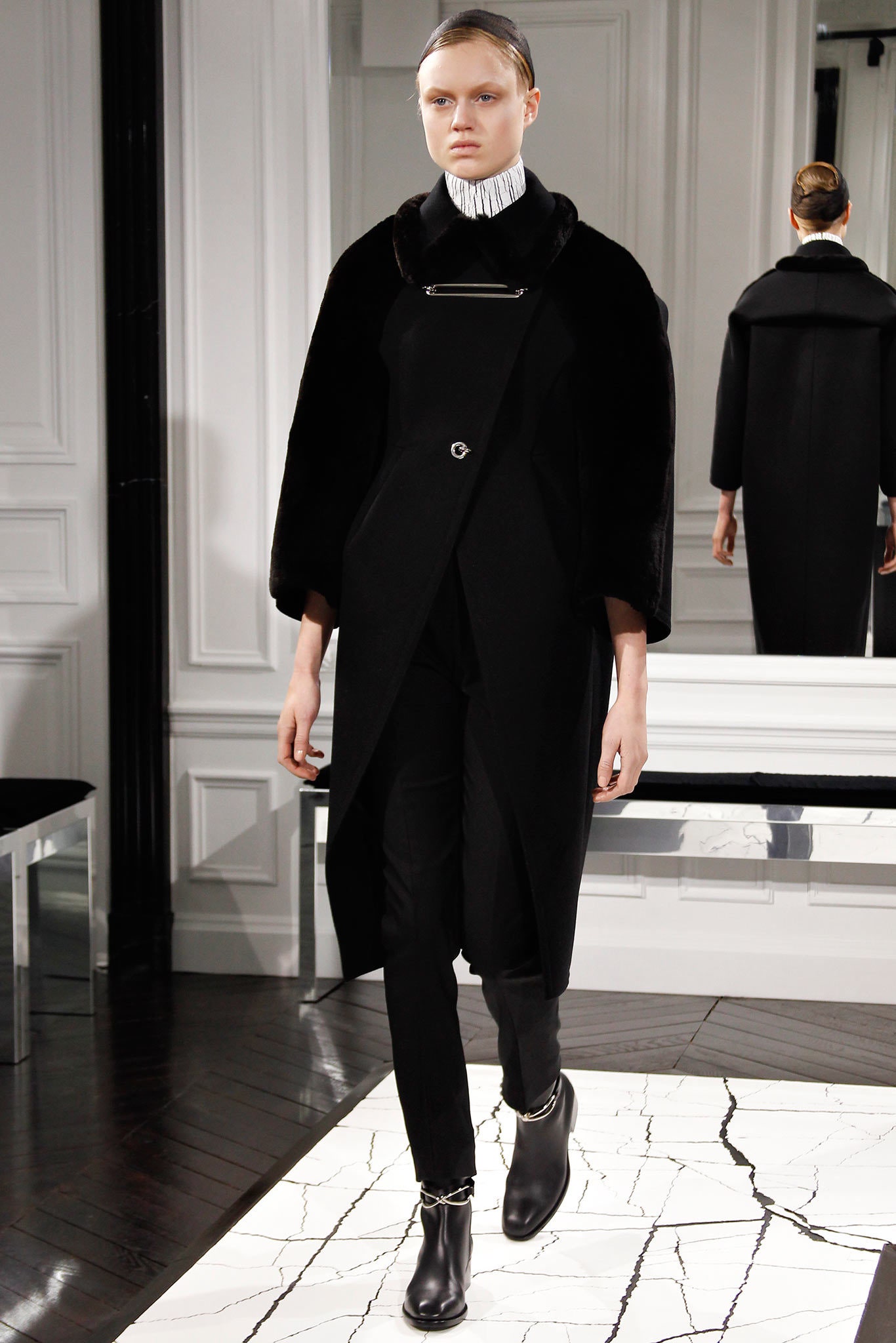 black structured coat with slim pants