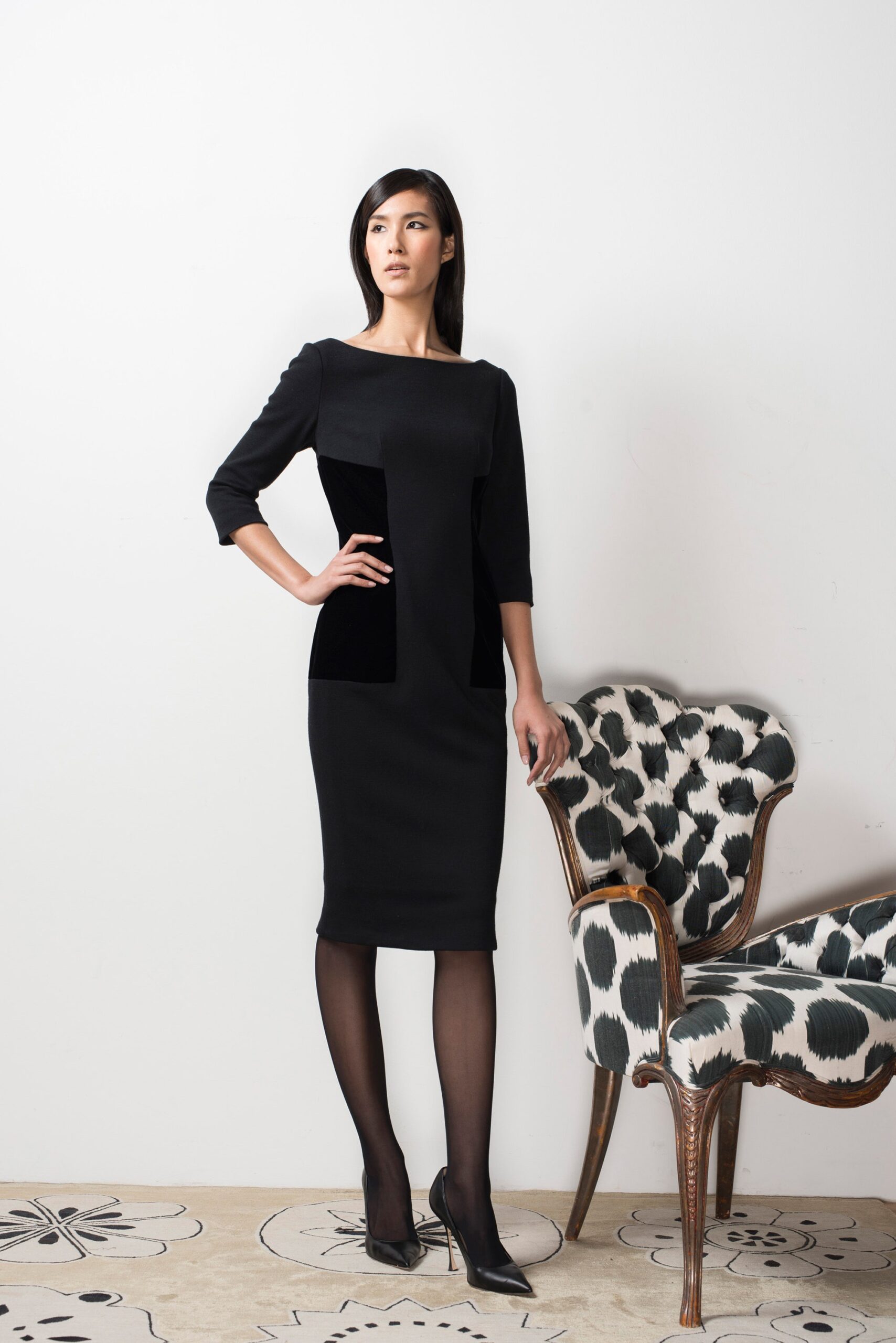 black fitted midi dress