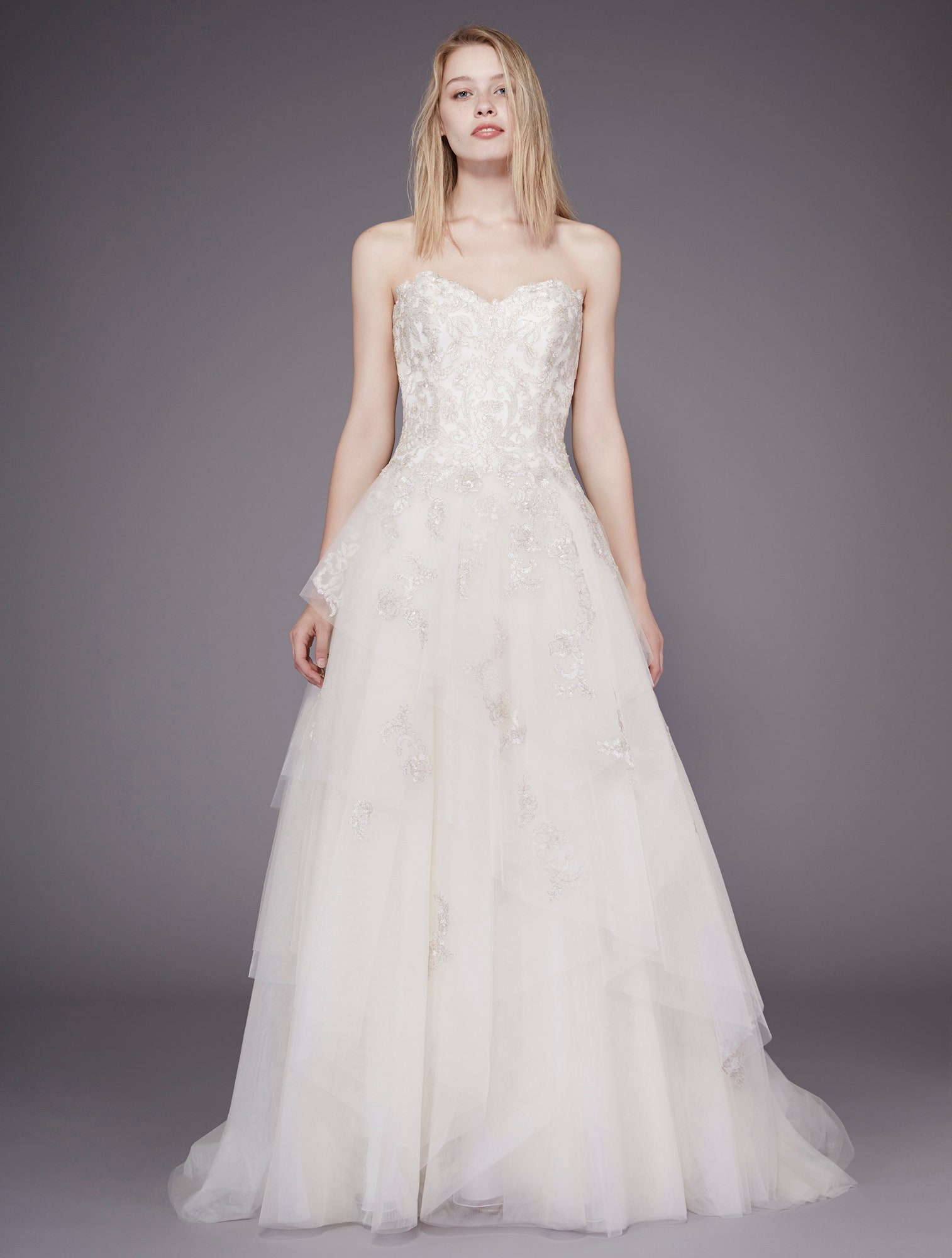 white strapless embroidered gown