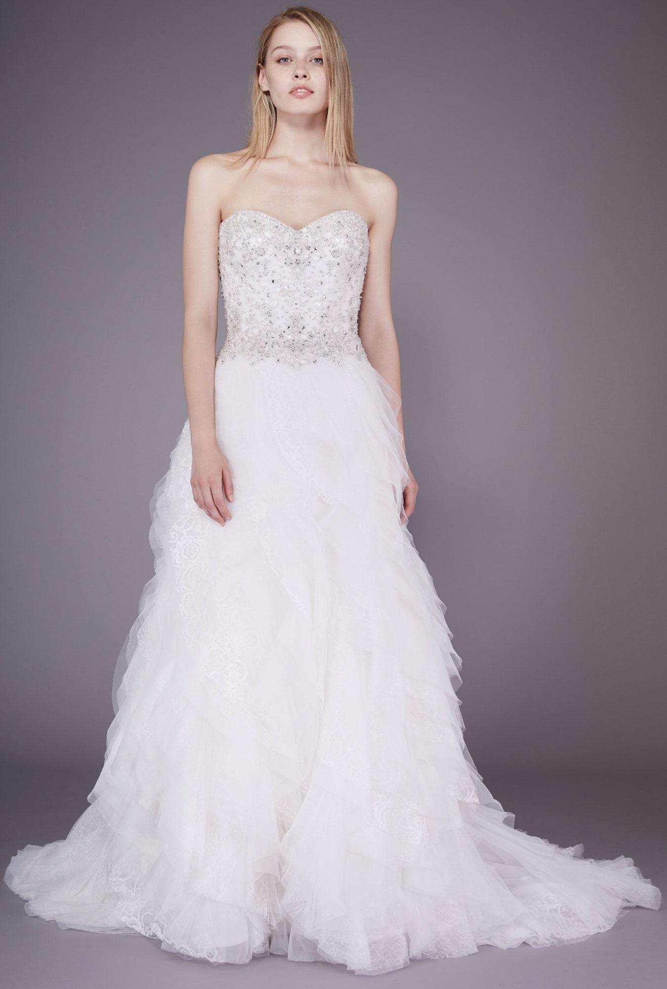 white strapless ruffled gown