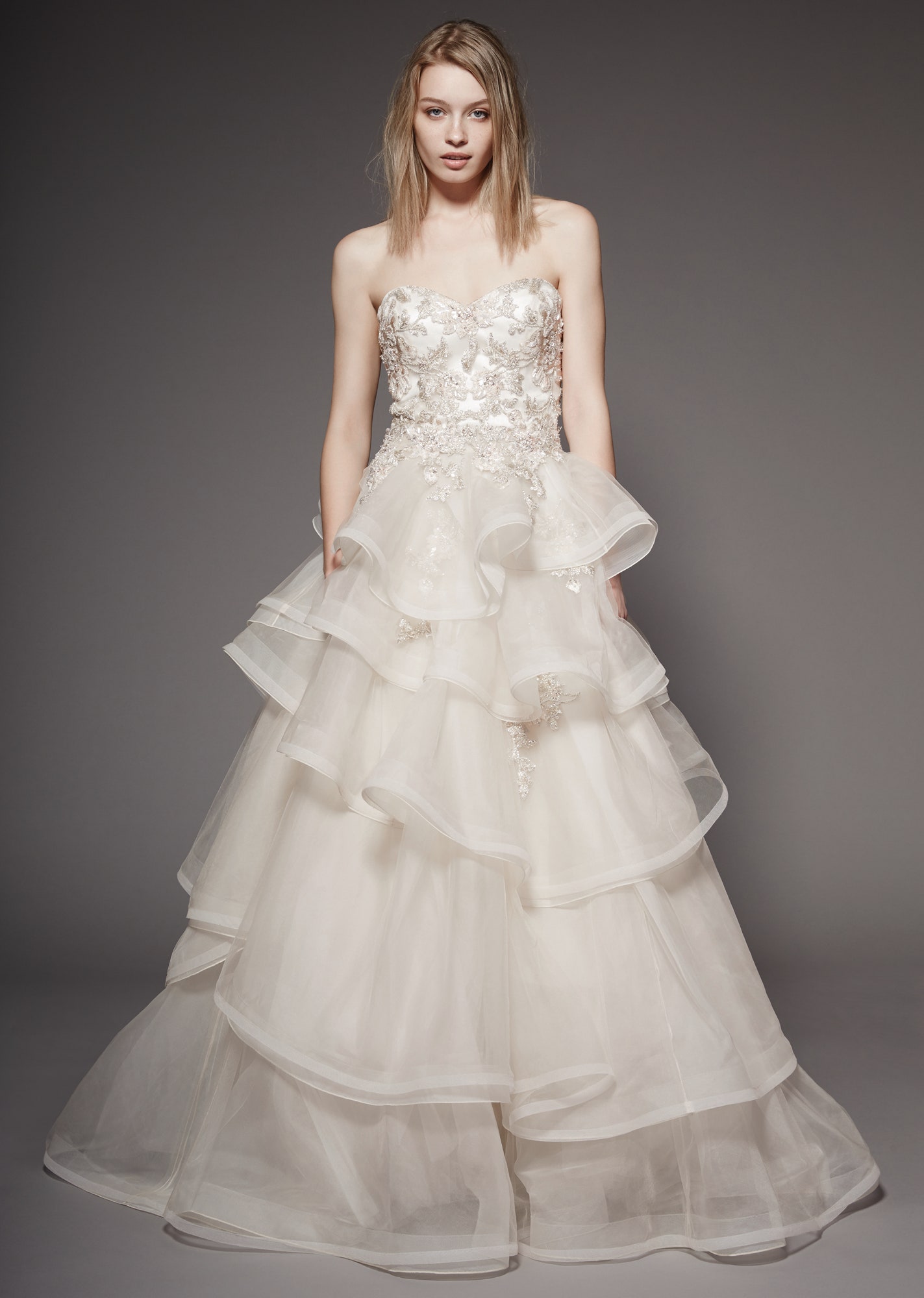 white strapless layered gown