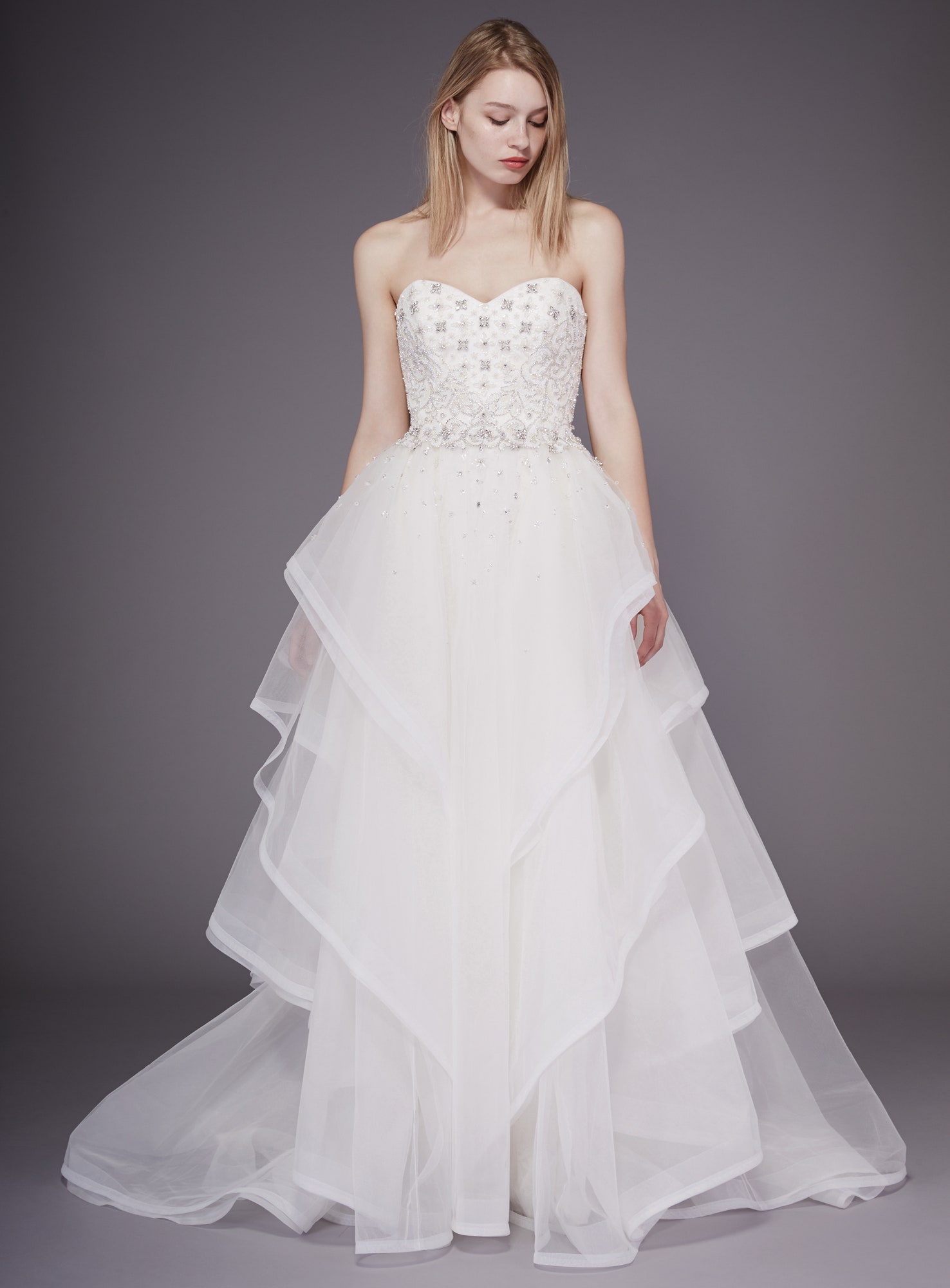 white strapless layered gown