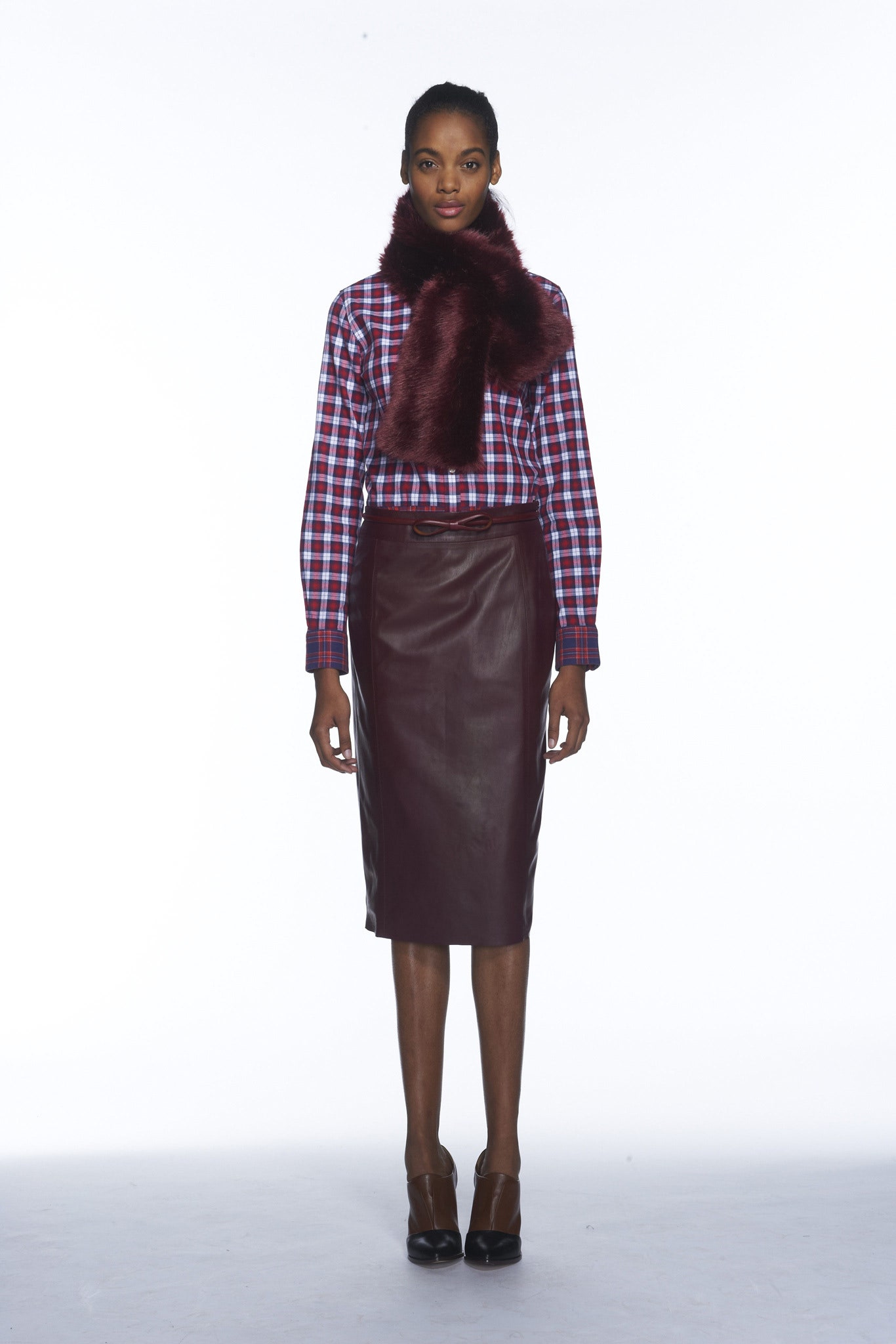 fitted checked shirt with leather skirt