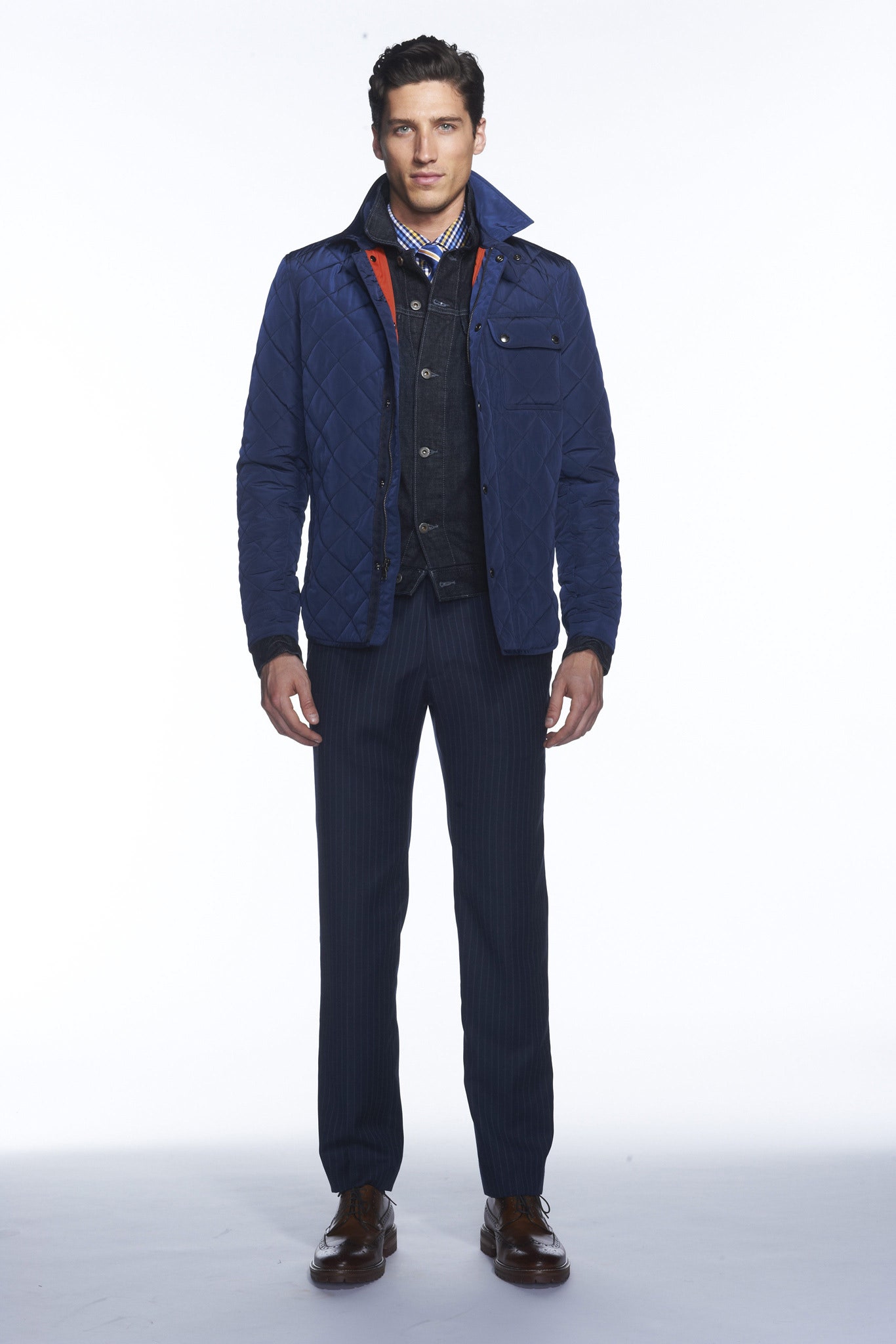 blue quilted jacket with black shirt