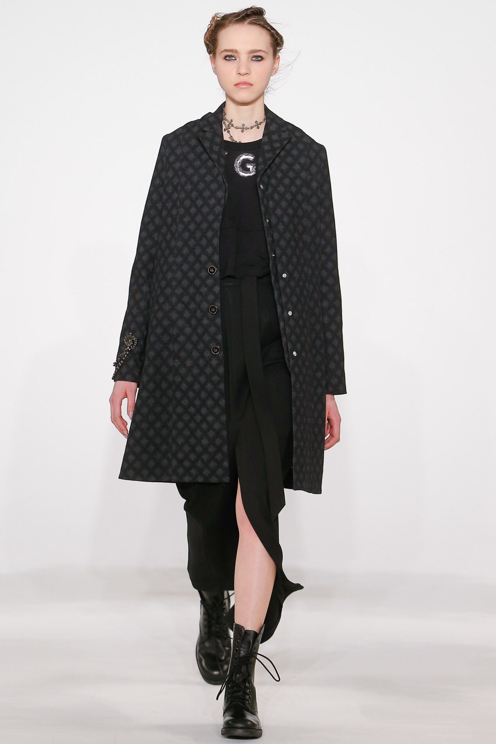 black cotton long-sleeve collared relaxed buttoned layered coat