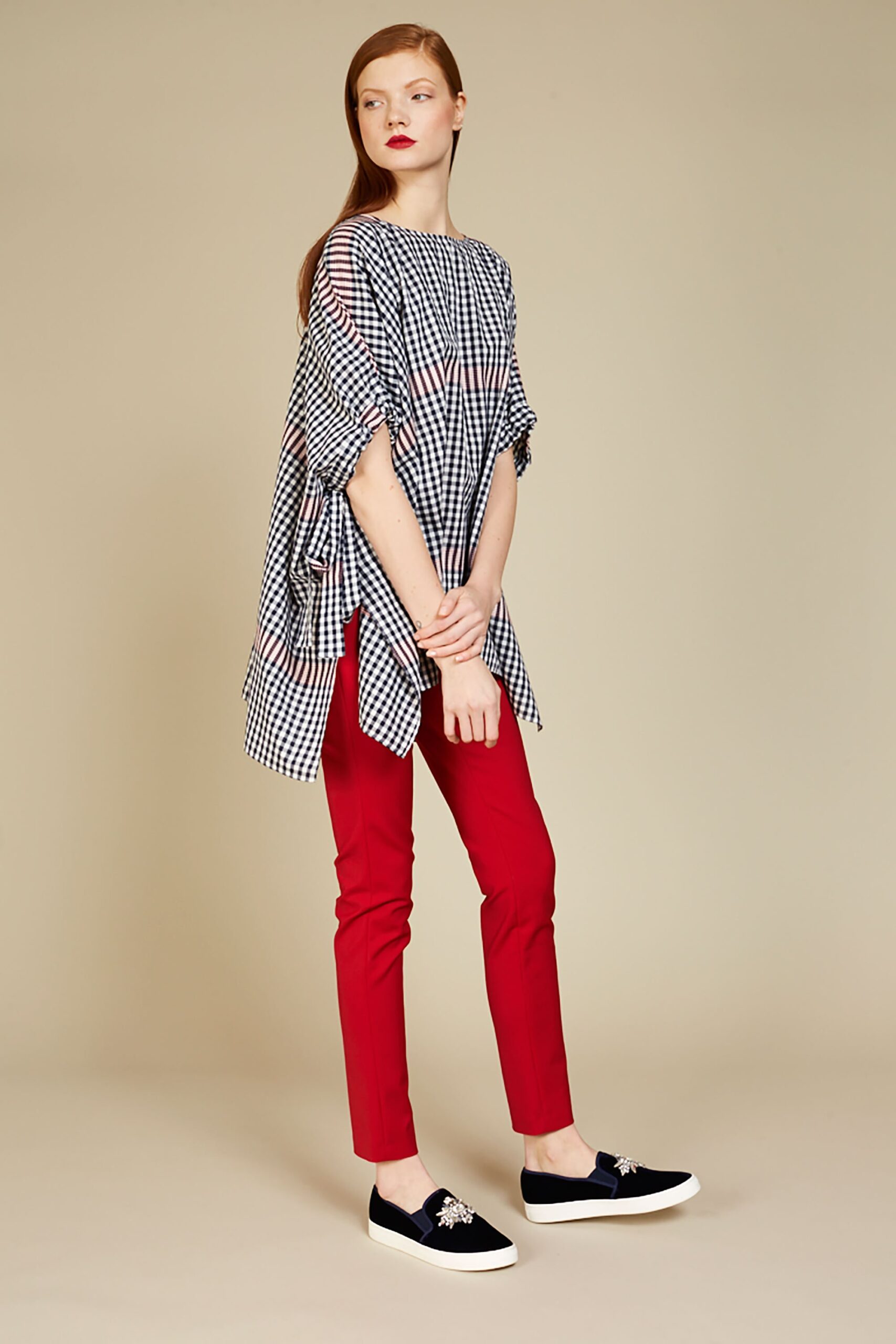 checked top with red pants