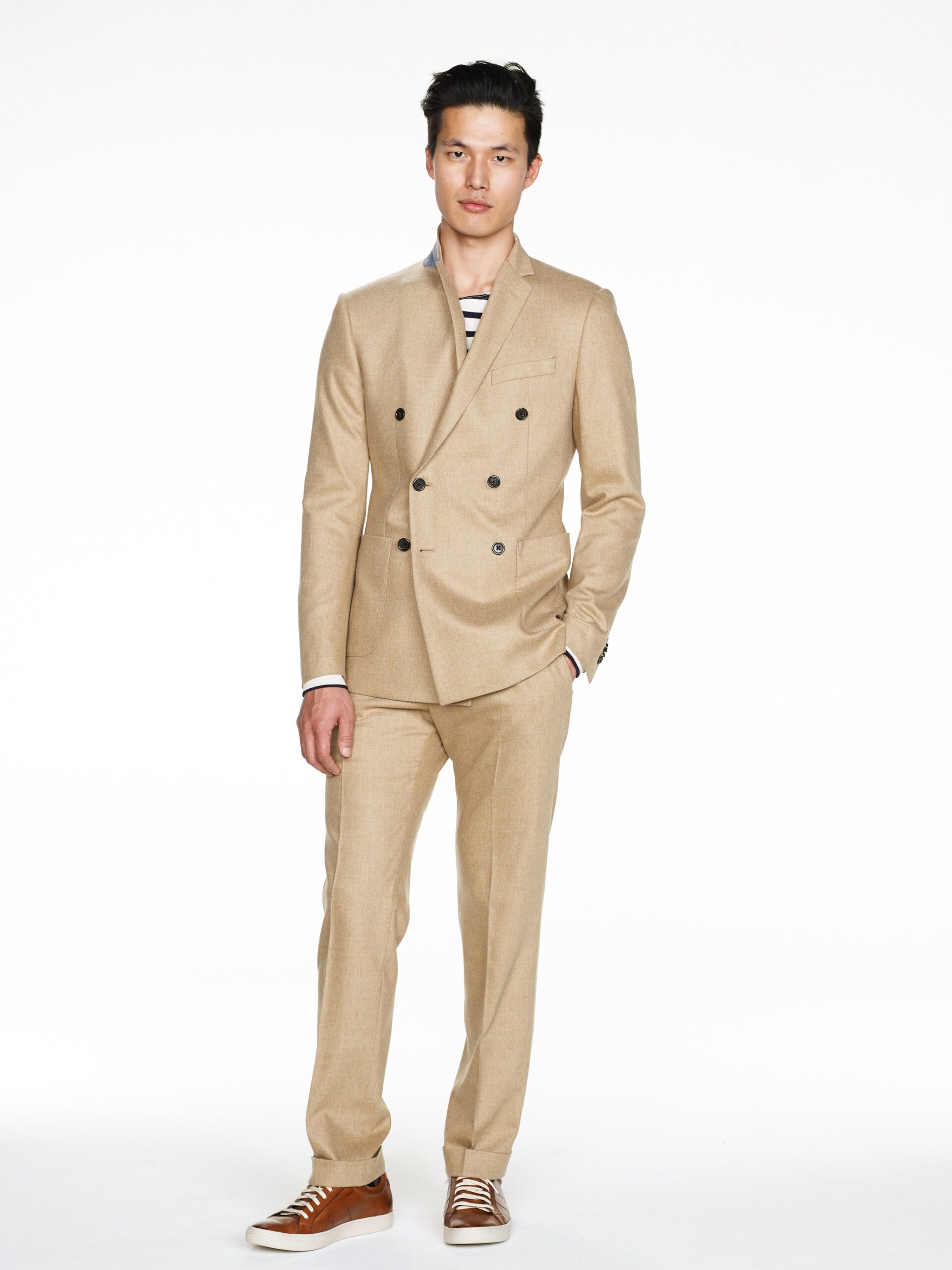 beige tailored suit with brown shoes